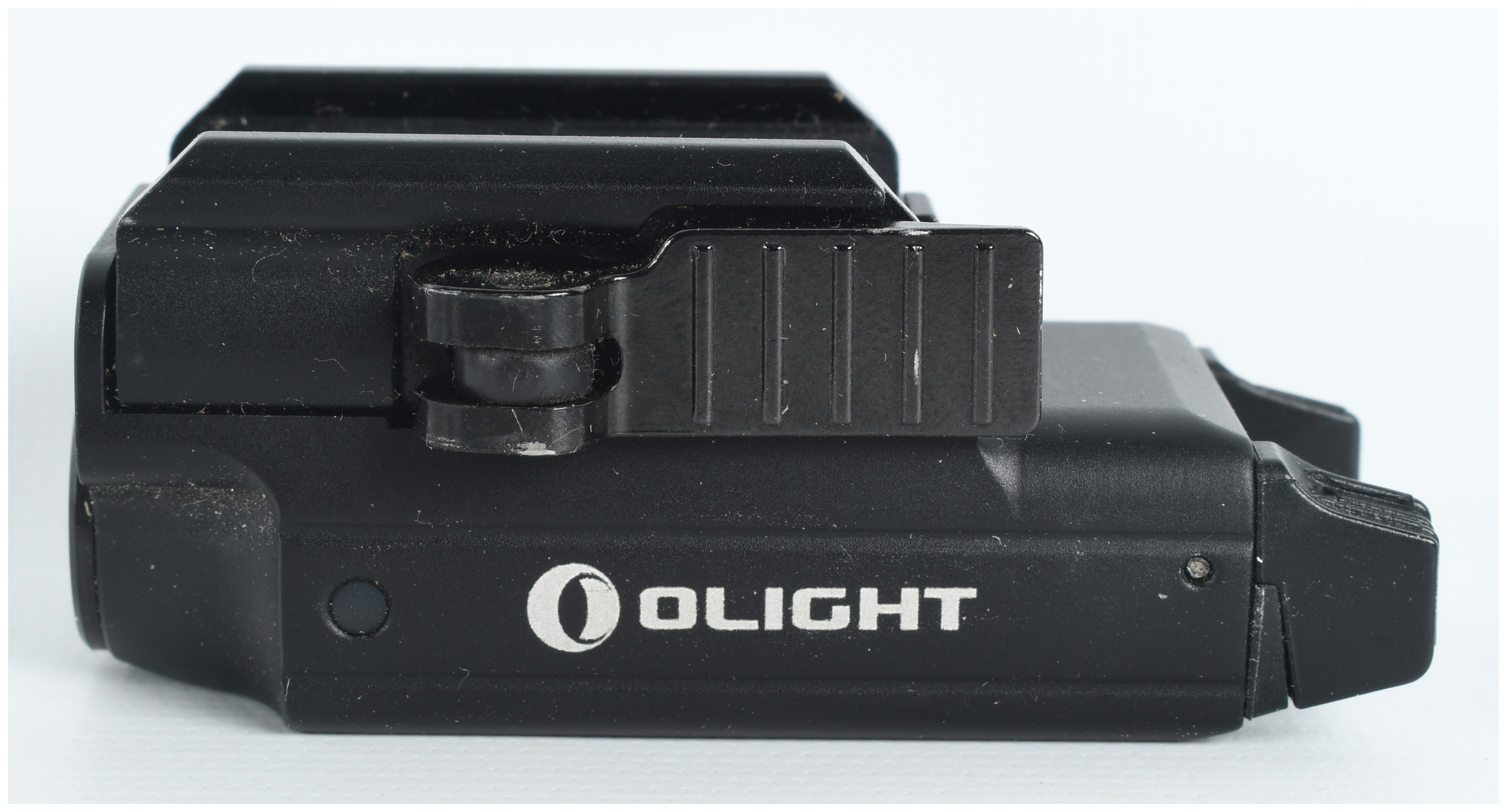 A Trio of Tactical Weapon Lights Including Olight PL-Mini Valkyrie, Streamlight TLR-4, and Streamlight TLR-1 HL