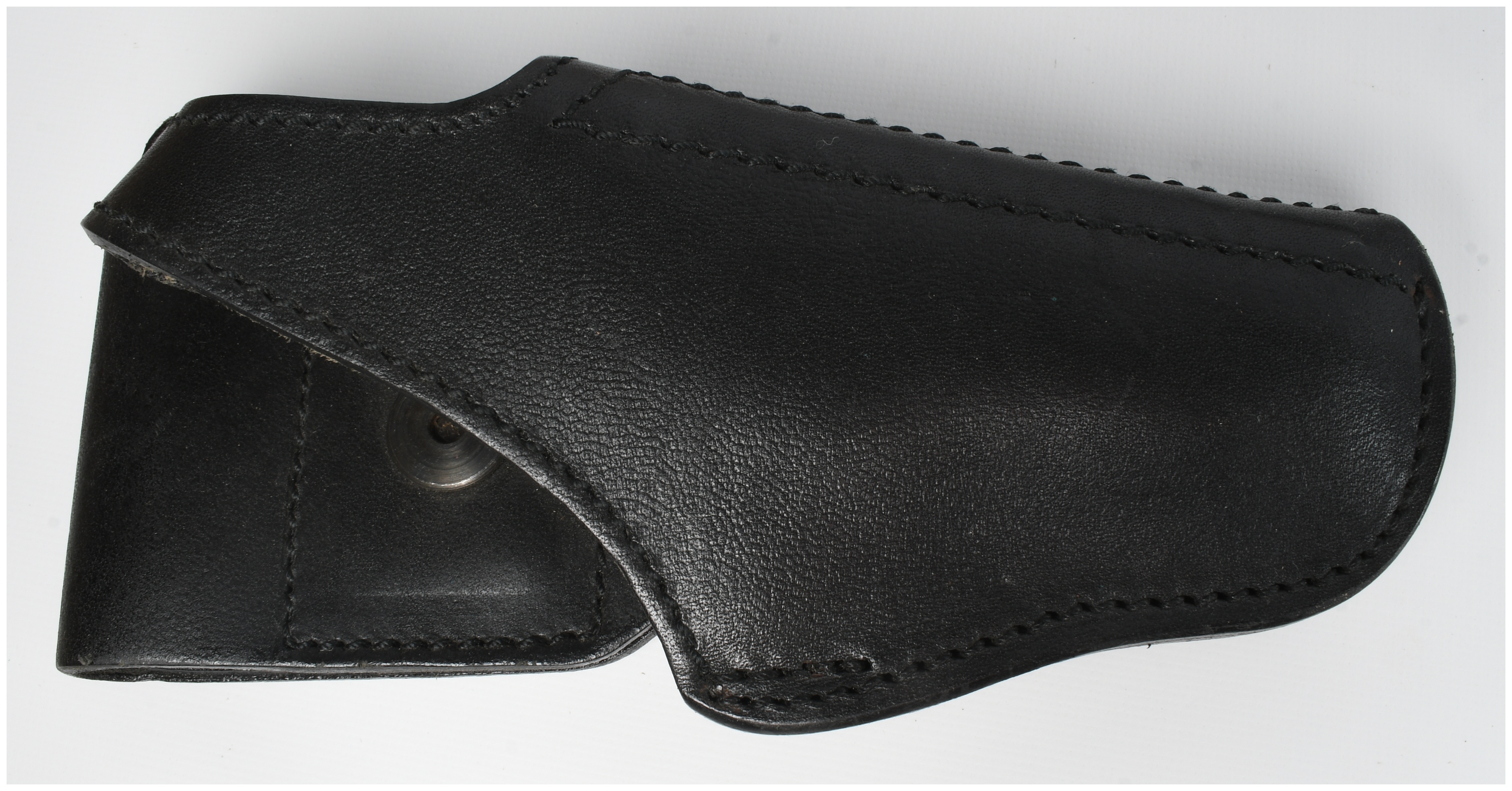 A Collection of 4 Assorted Leather and Nylon Pistol Holsters