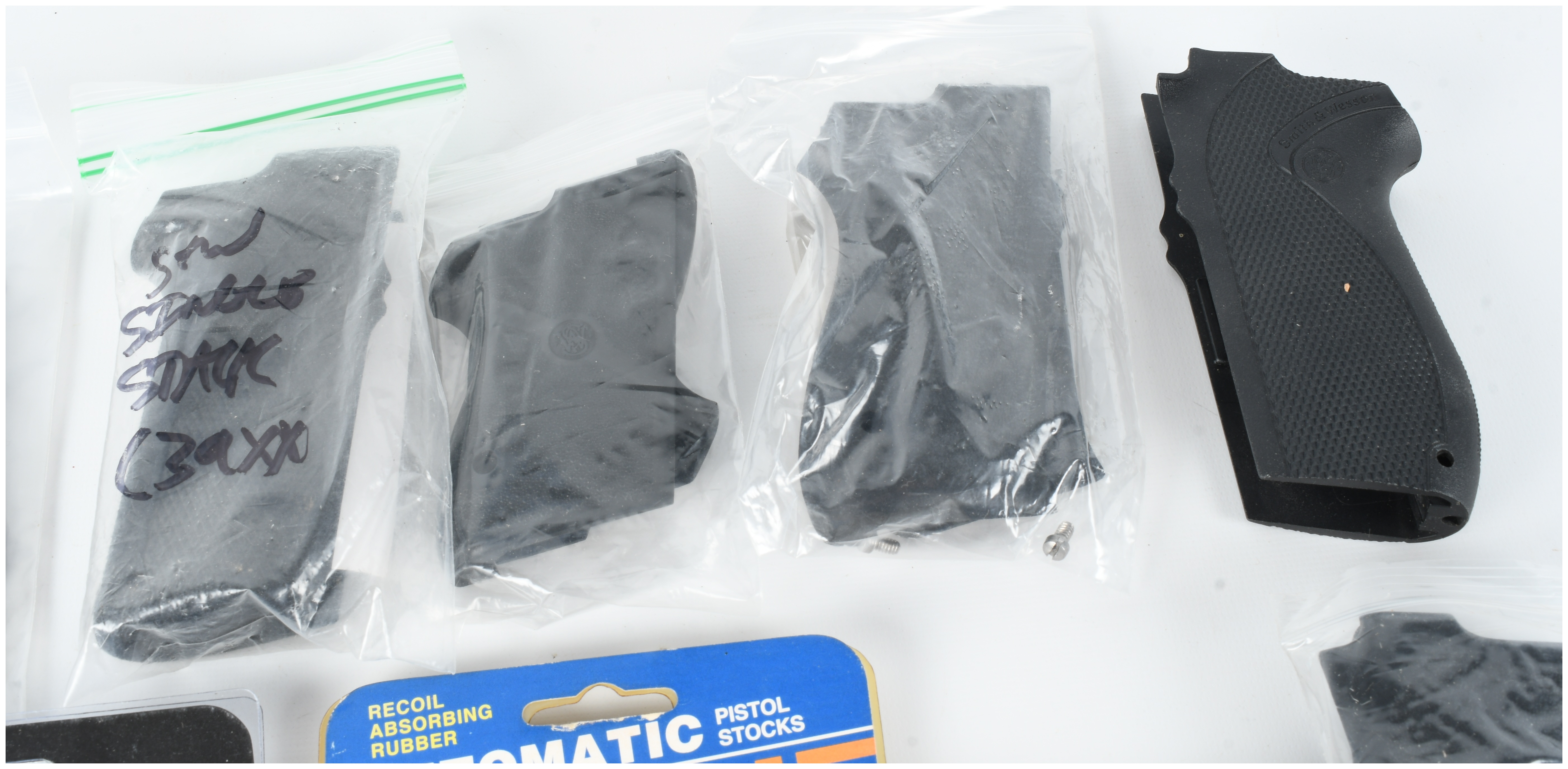A Collection of 11 Smith and Wesson Third Generation Semi-Automatic Pistol Grip Sets