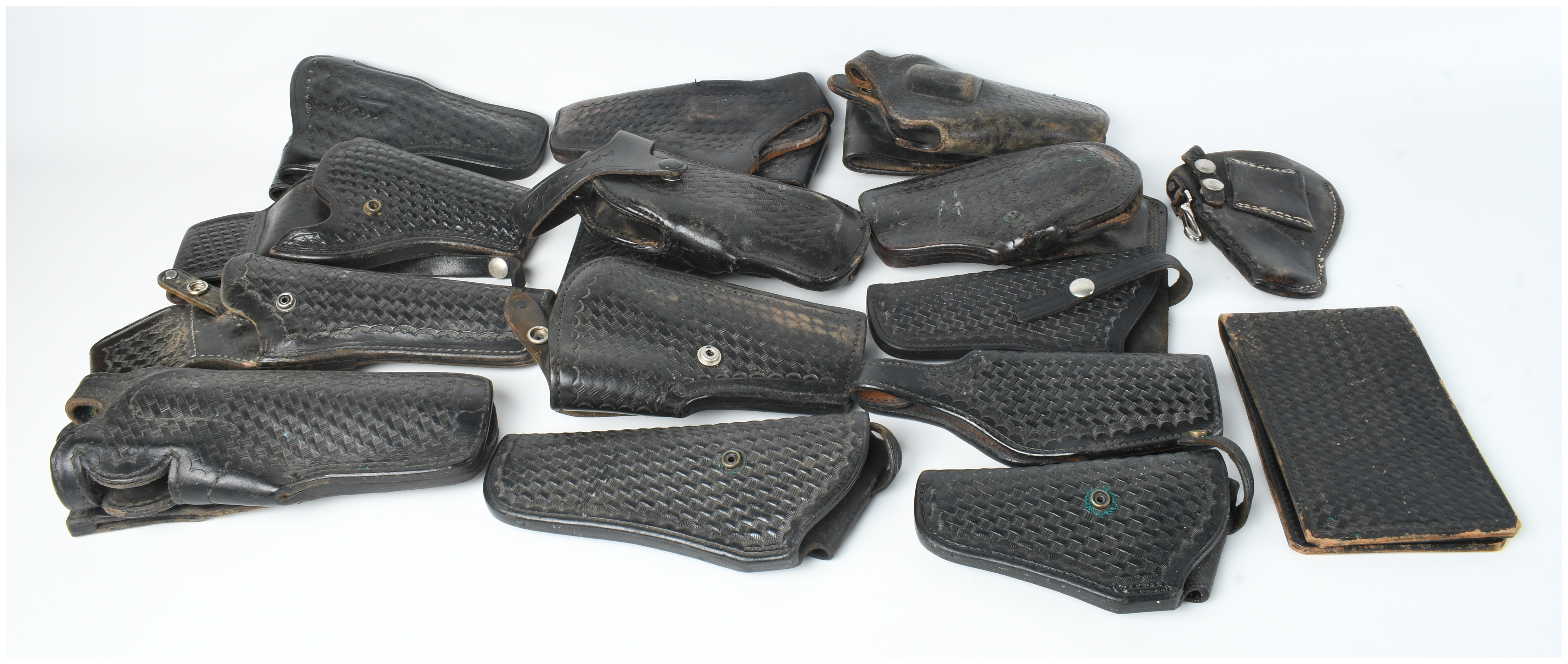 A Collection of 15 Leather Holsters and Accessories