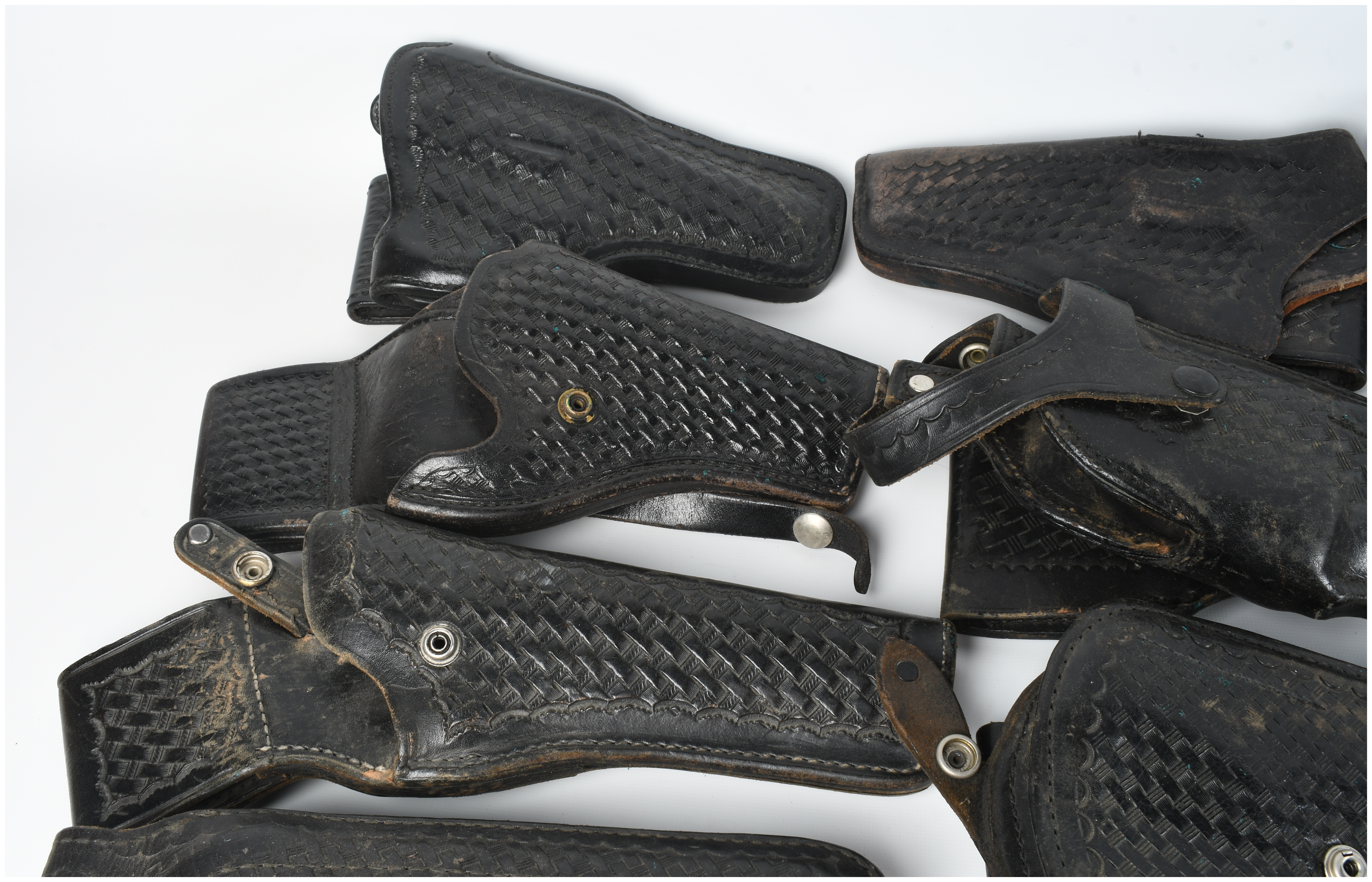 A Collection of 15 Leather Holsters and Accessories