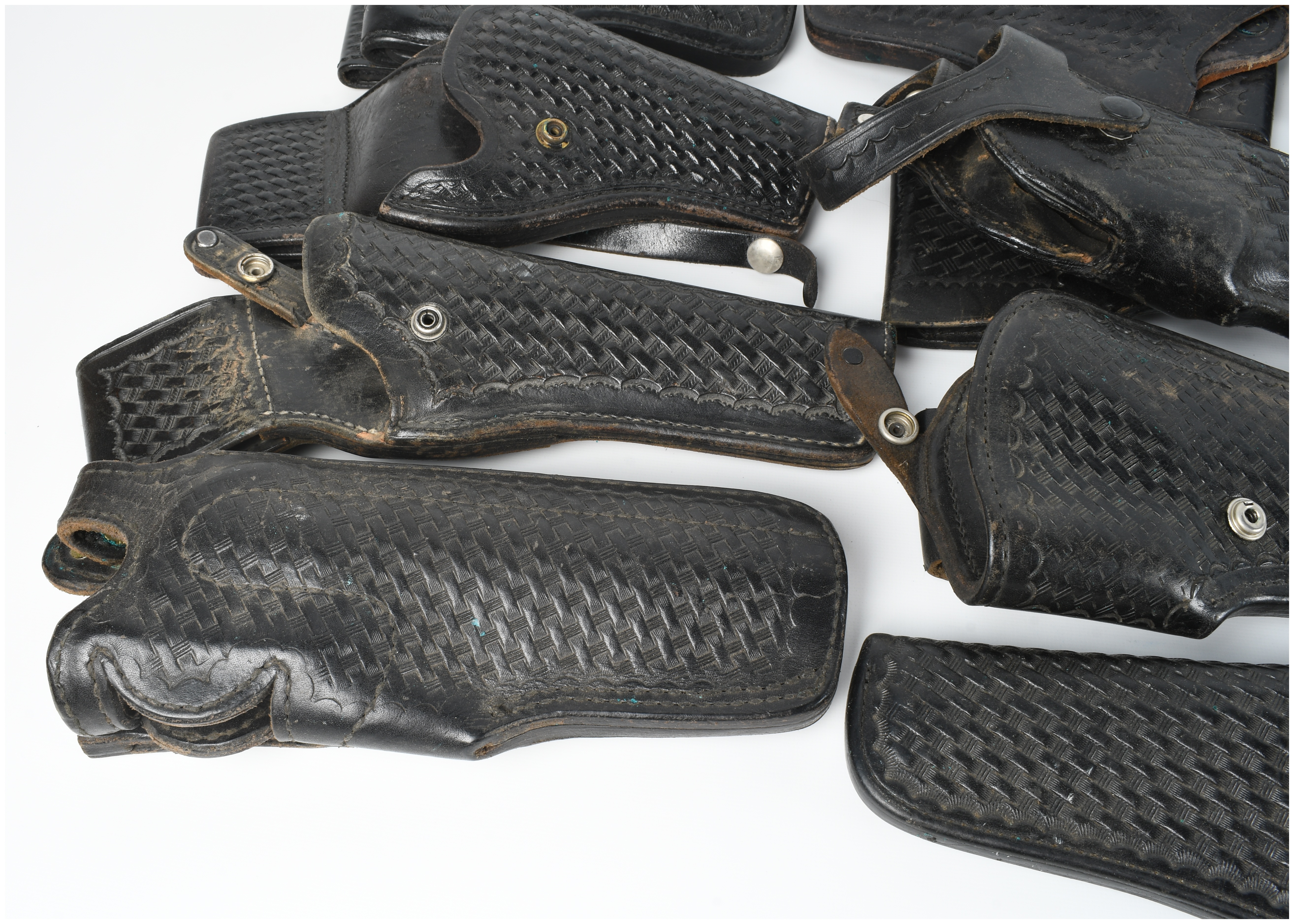 A Collection of 15 Leather Holsters and Accessories