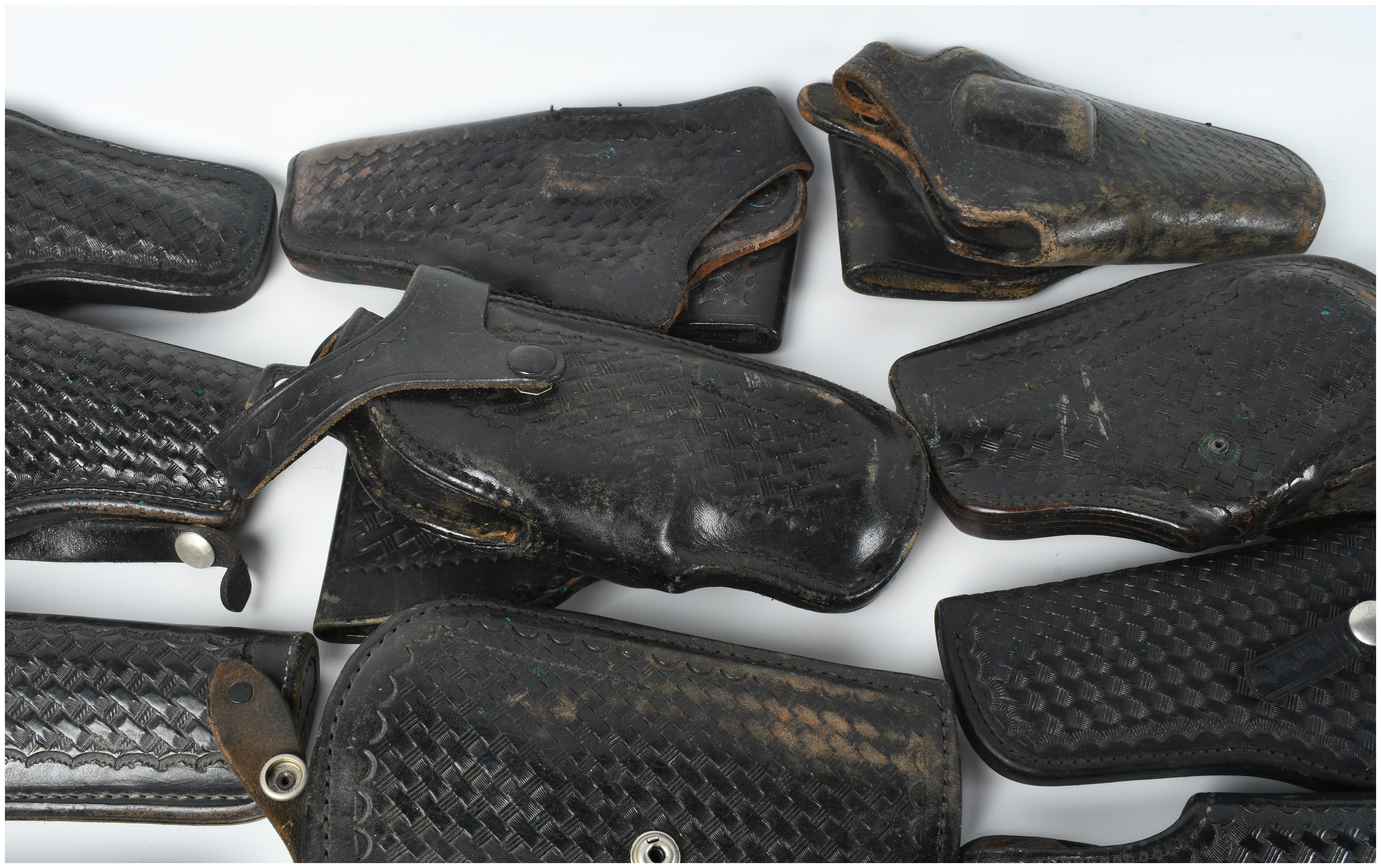 A Collection of 15 Leather Holsters and Accessories