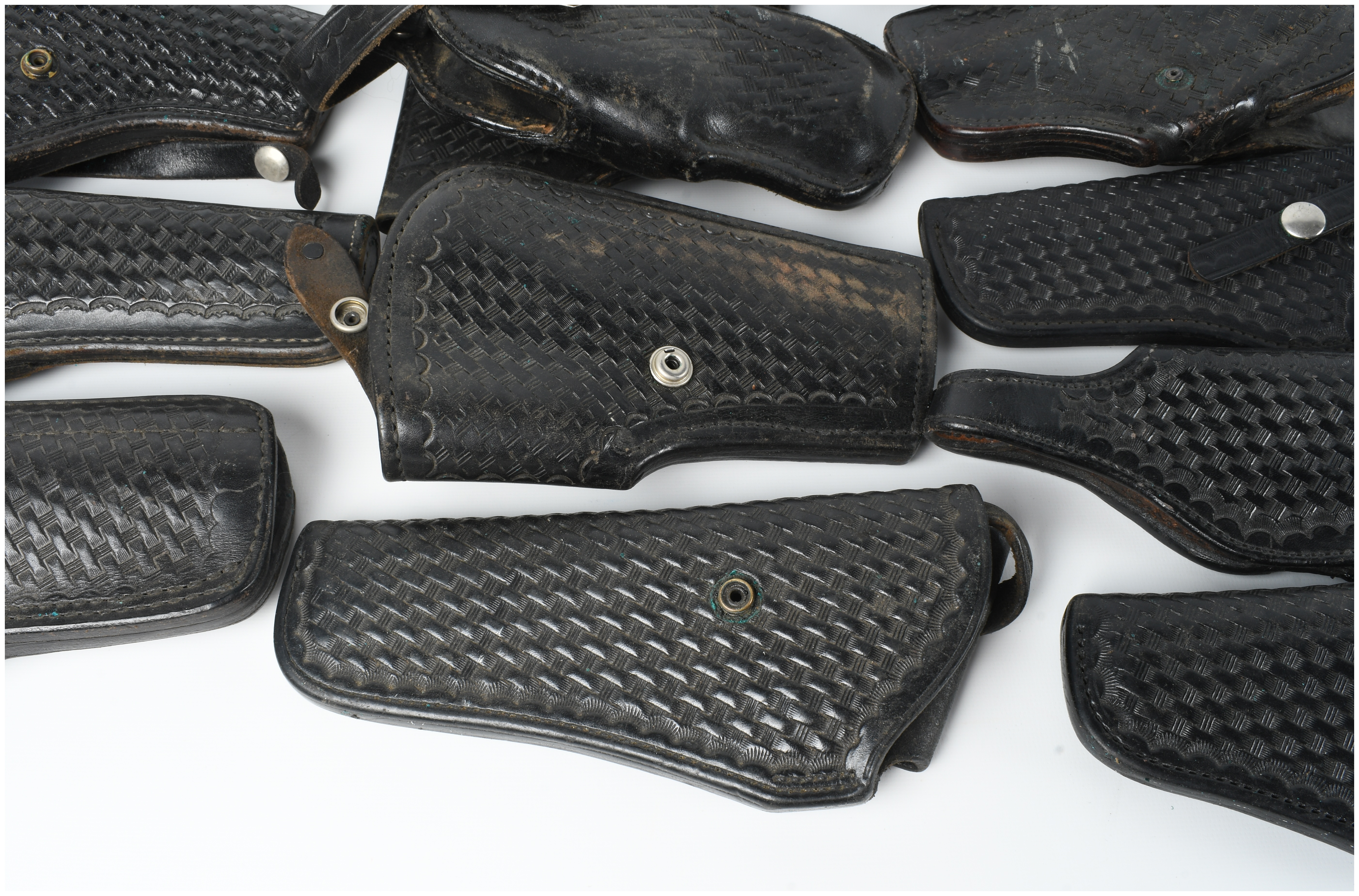 A Collection of 15 Leather Holsters and Accessories