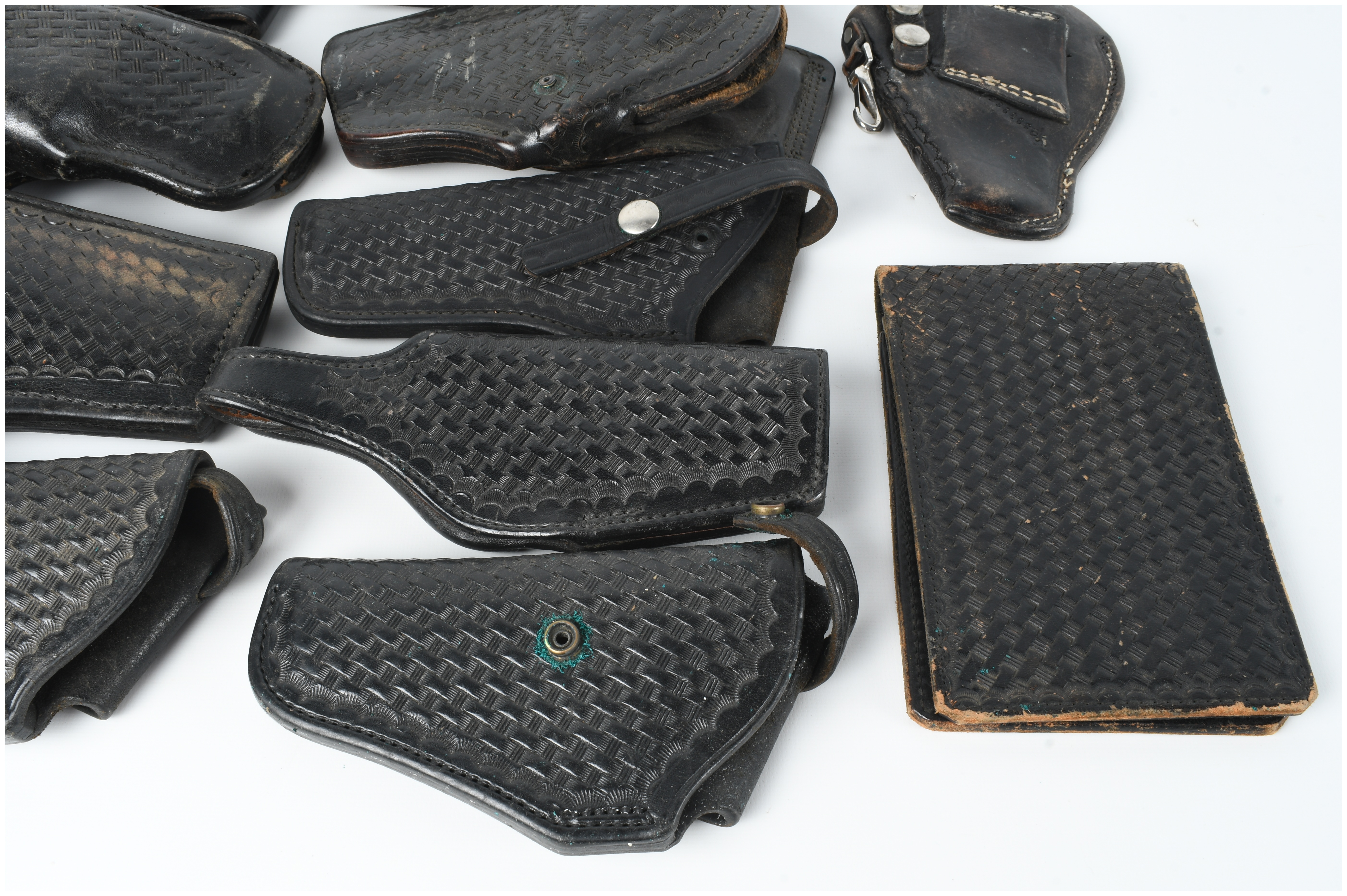 A Collection of 15 Leather Holsters and Accessories