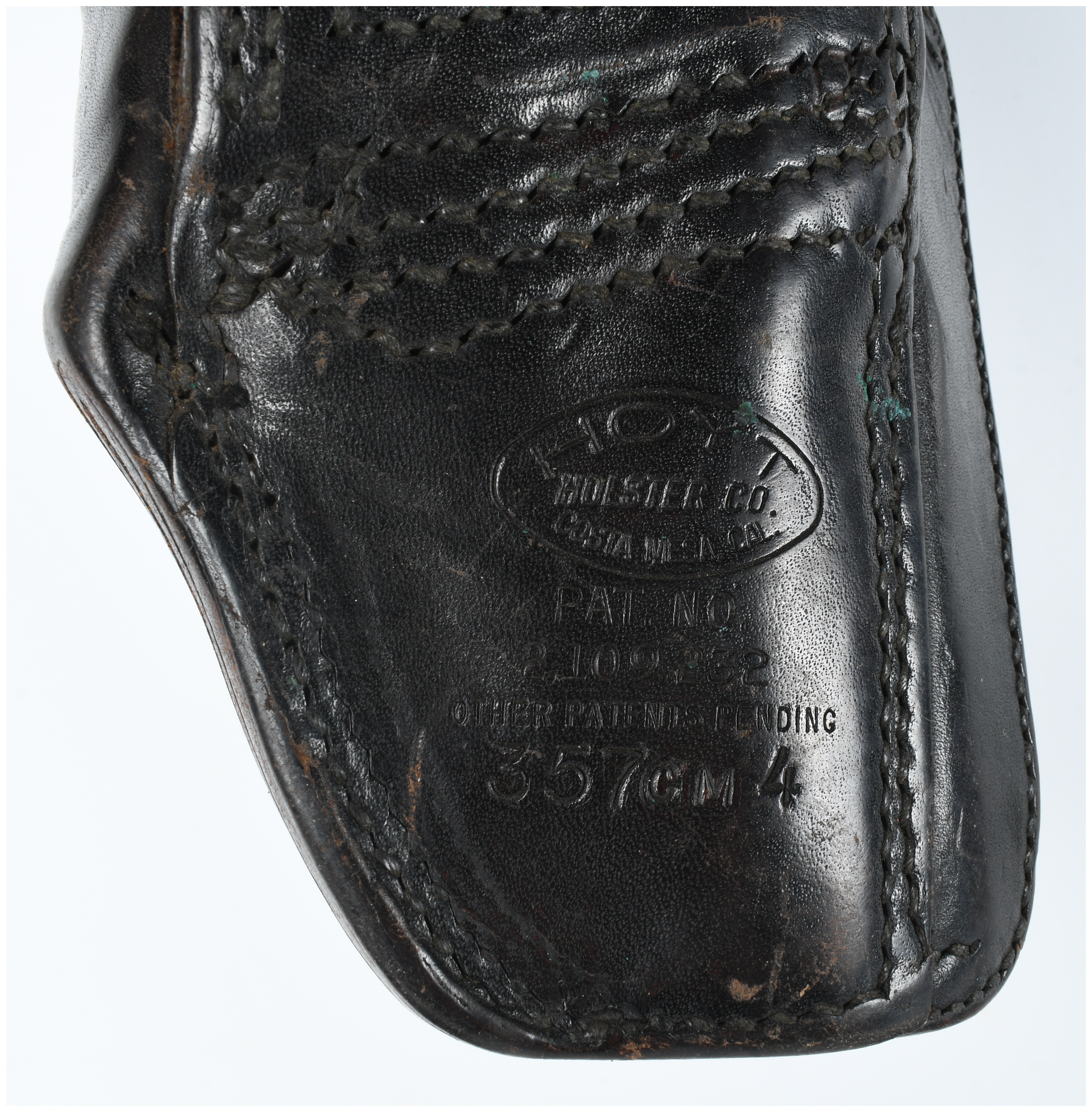 A Collection Of 9 Assorted Leather And Polymer Handgun Holsters