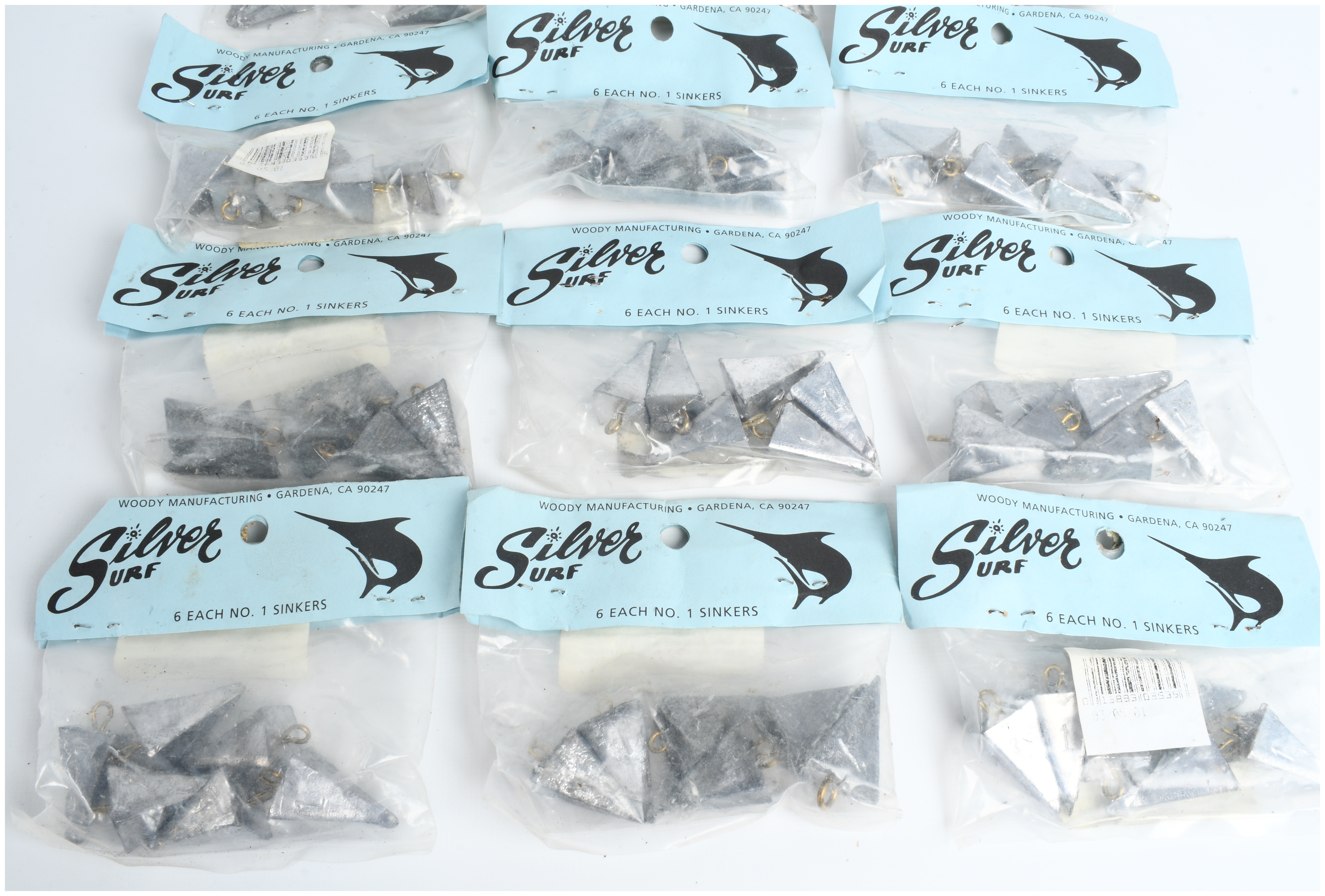 A Collection of 72 Silver Surf No. 1 Pyramid Fishing Sinkers