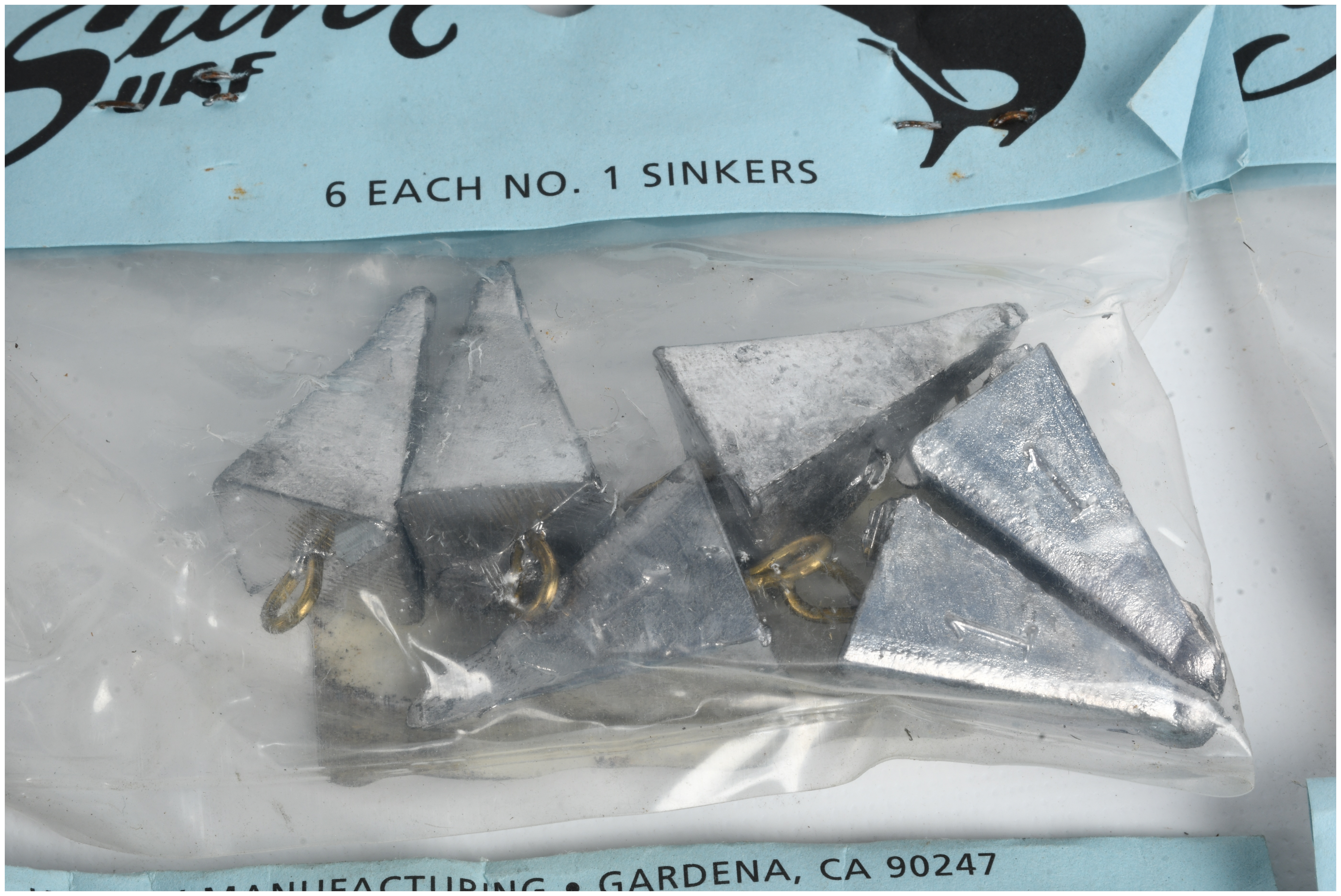 A Collection of 72 Silver Surf No. 1 Pyramid Fishing Sinkers
