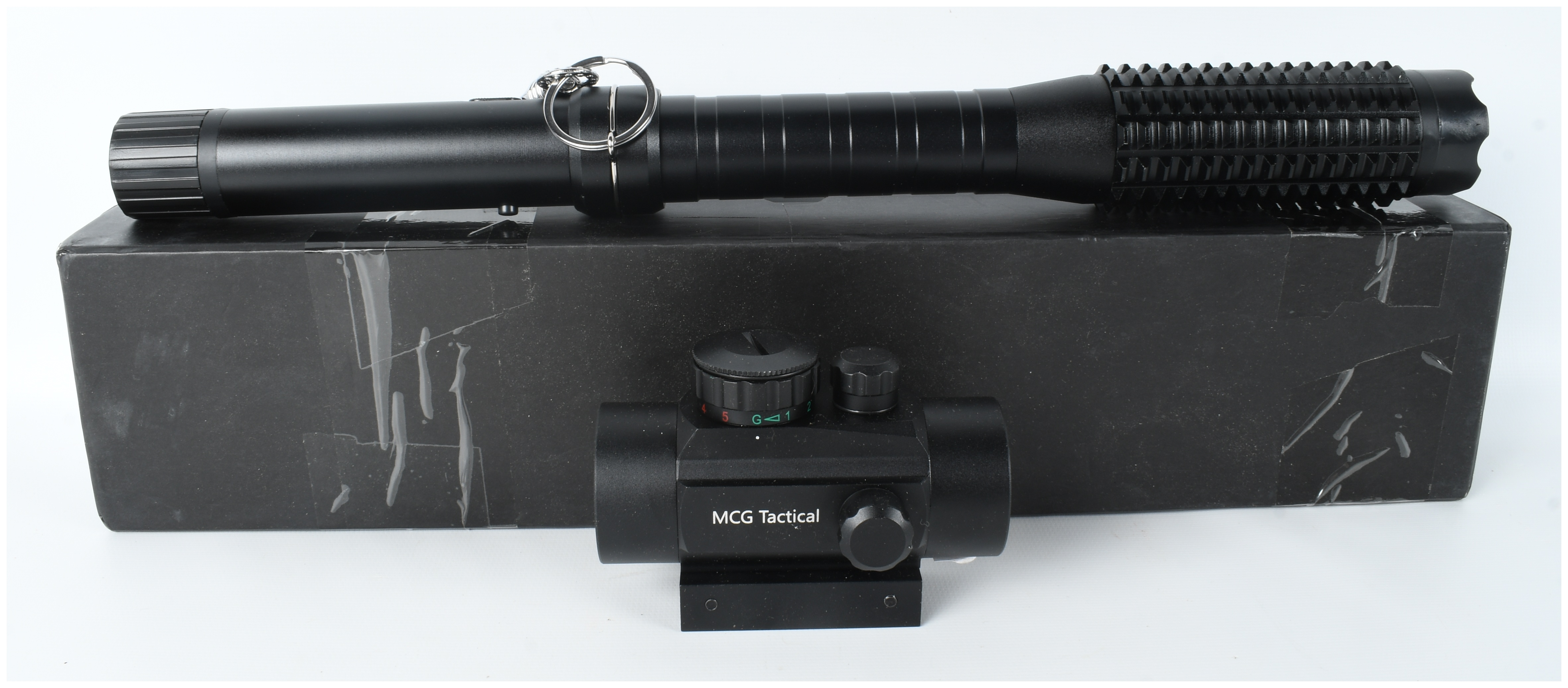 A Group of Two Tactical Accessories Including an MCG Tactical Red Dot Sight and a Stun Baton Flashlight