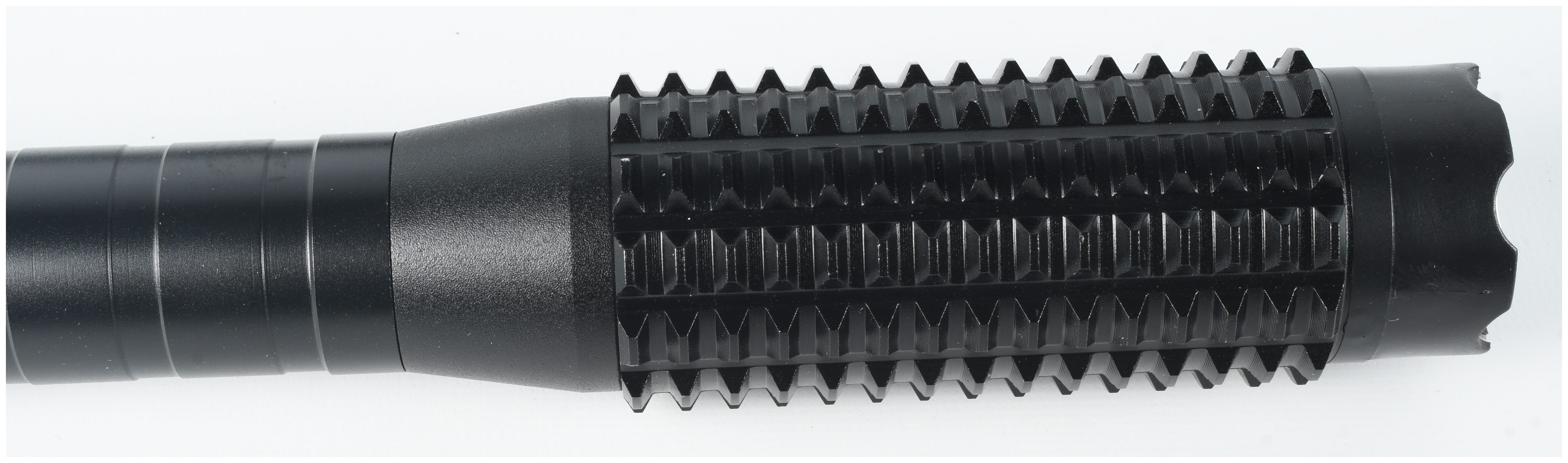 A Group of Two Tactical Accessories Including an MCG Tactical Red Dot Sight and a Stun Baton Flashlight