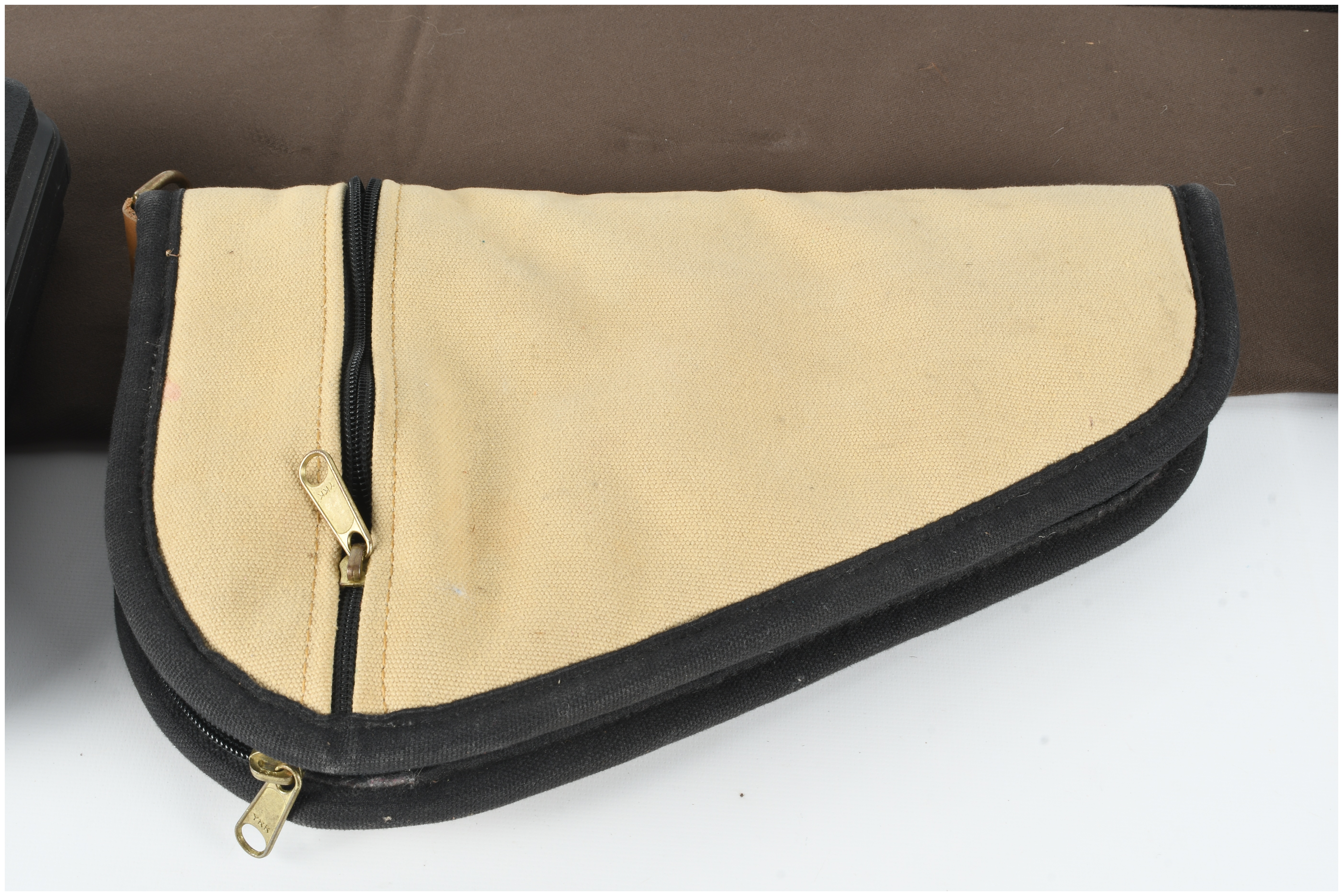 A Collection of Shooting Accessories and Firearm Cases including an NRA Tactical Backpack