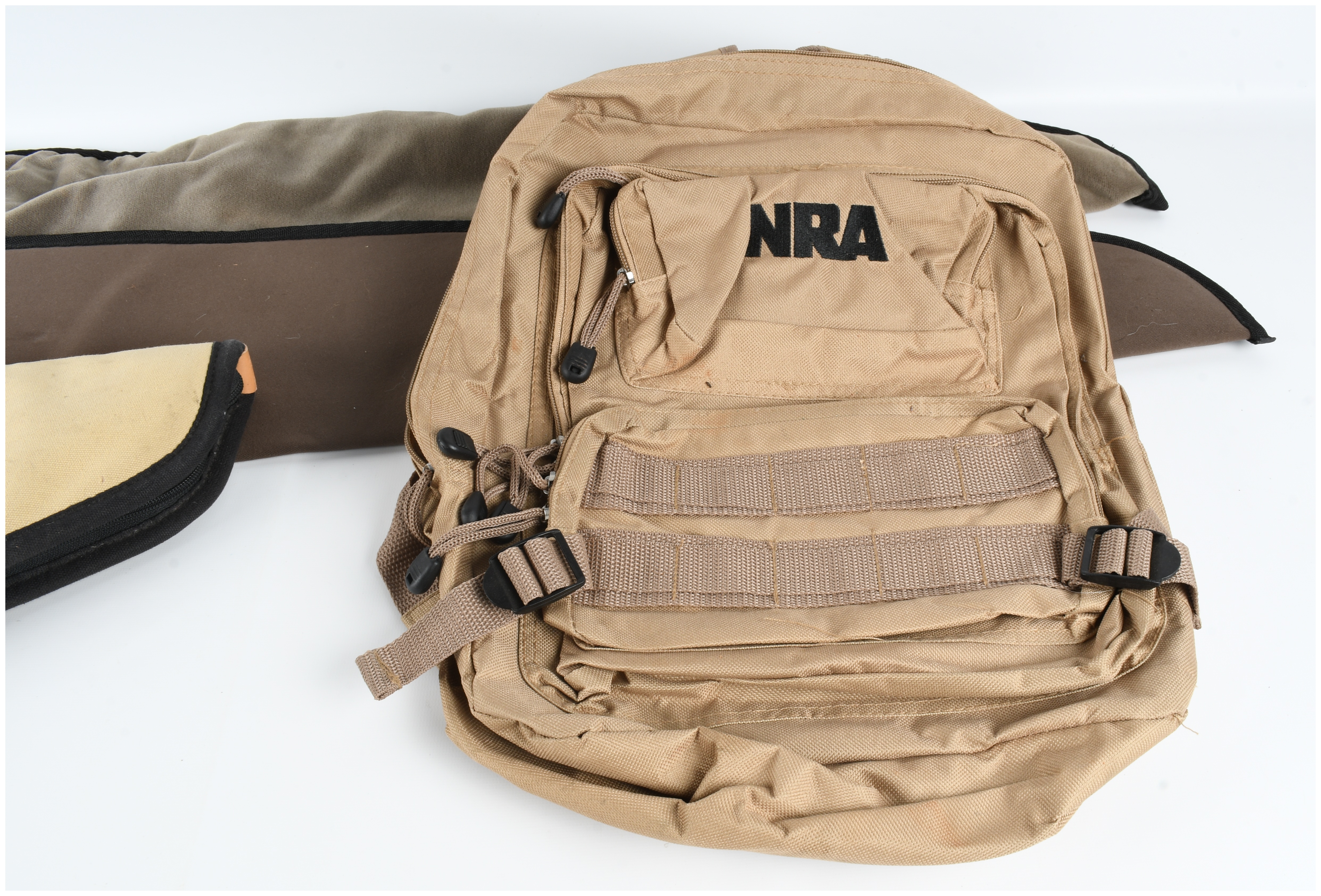 A Collection of Shooting Accessories and Firearm Cases including an NRA Tactical Backpack