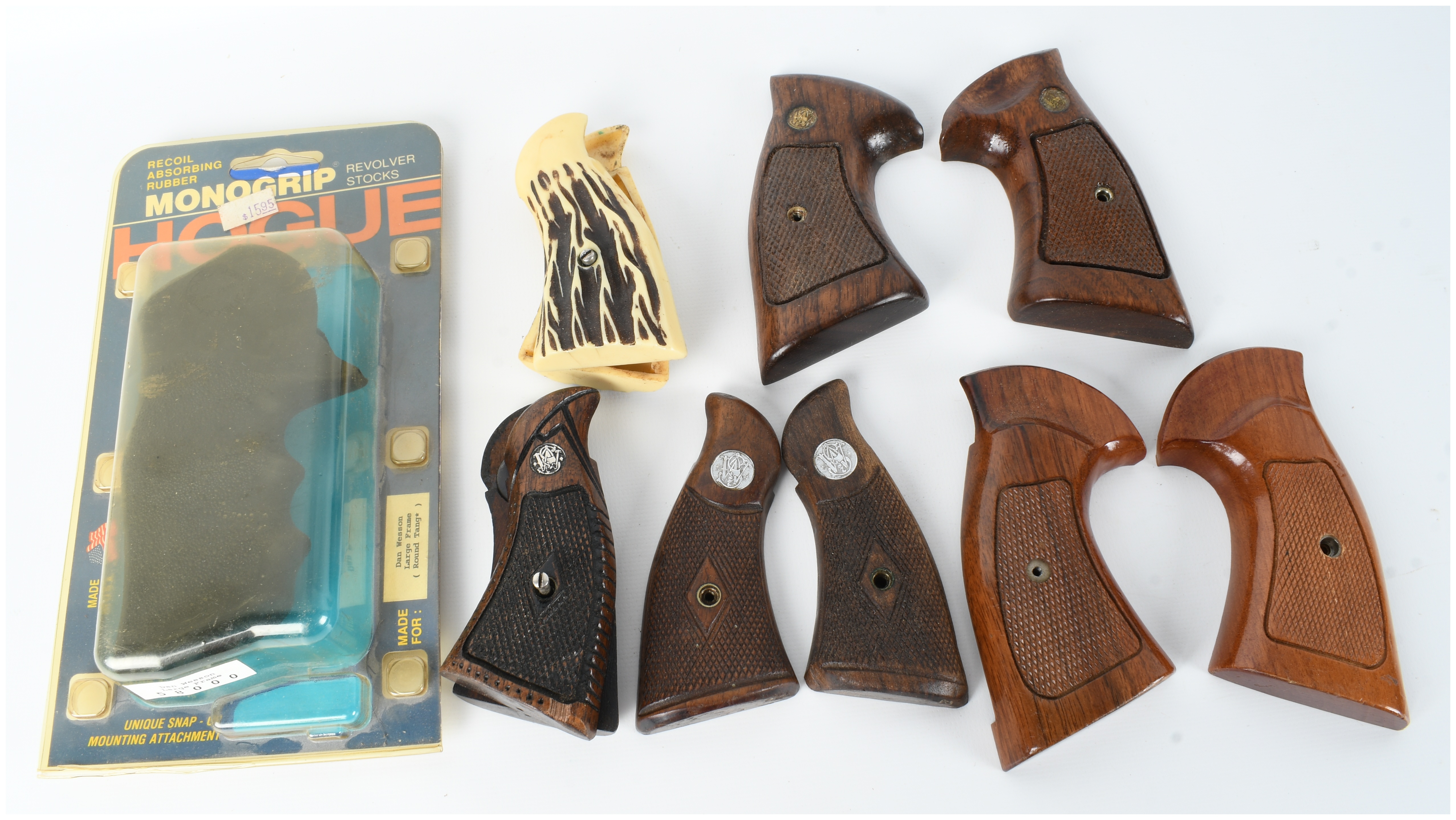 A Collection of 6 Revolver Grips and Stocks Including Smith and Wesson and Hogue