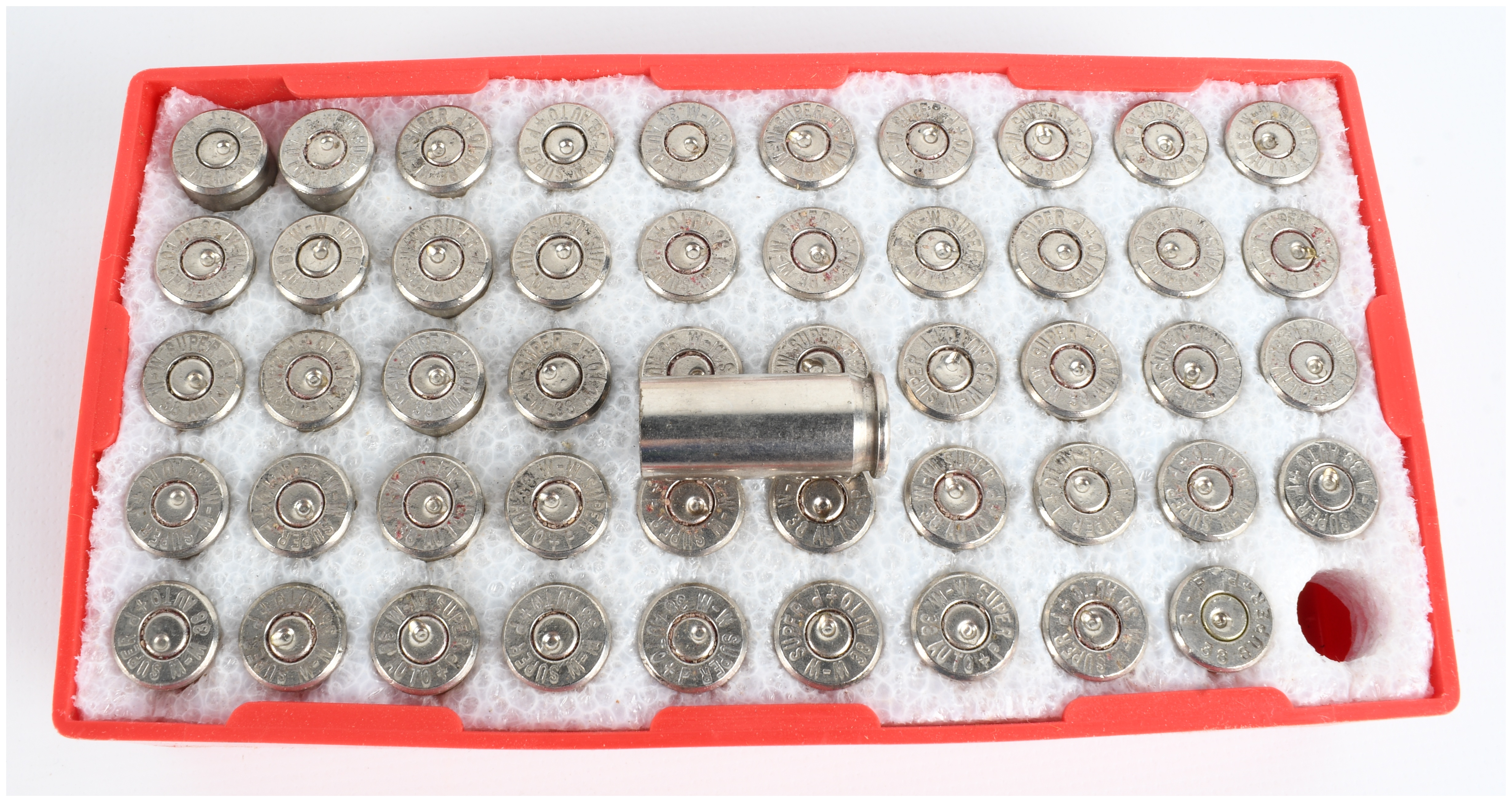 A Collection of 100 Winchester Super-X 38 Automatic Spent Ammunition Casings and Boxes