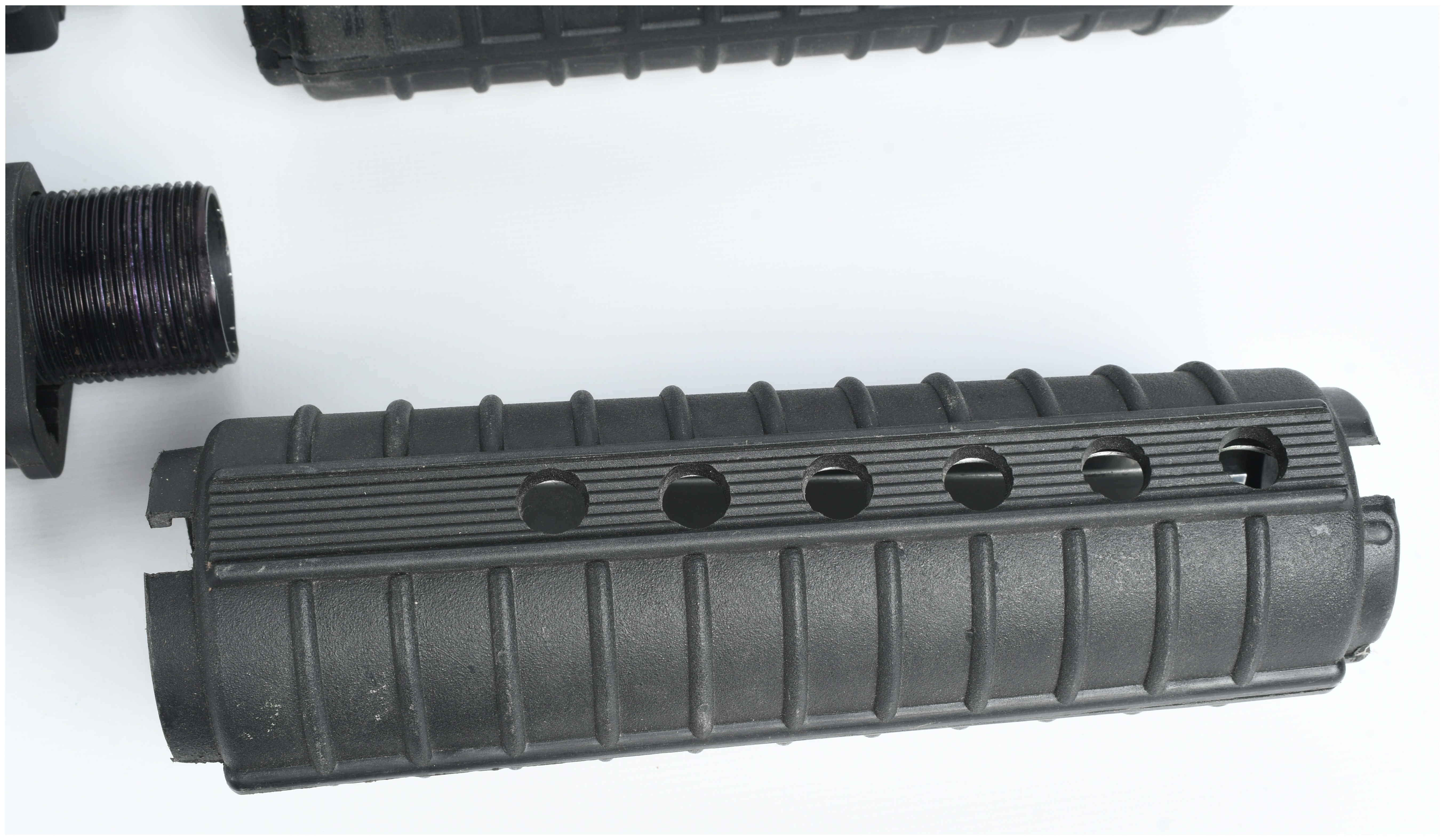 A Collection of 5 AR-15 Components Including a Stripped Upper Receiver and Collapsible Stocks