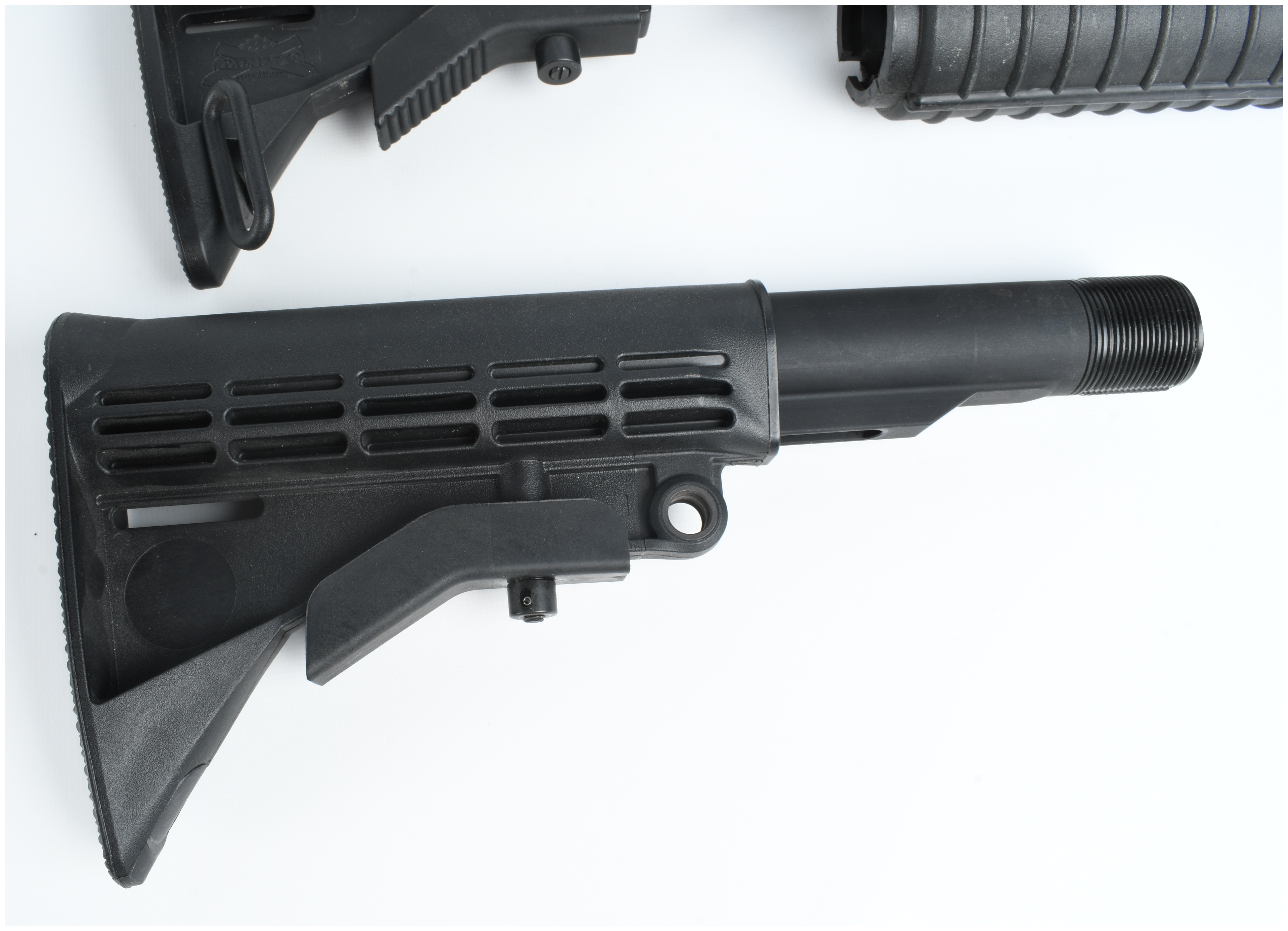 A Collection of 5 AR-15 Components Including a Stripped Upper Receiver and Collapsible Stocks