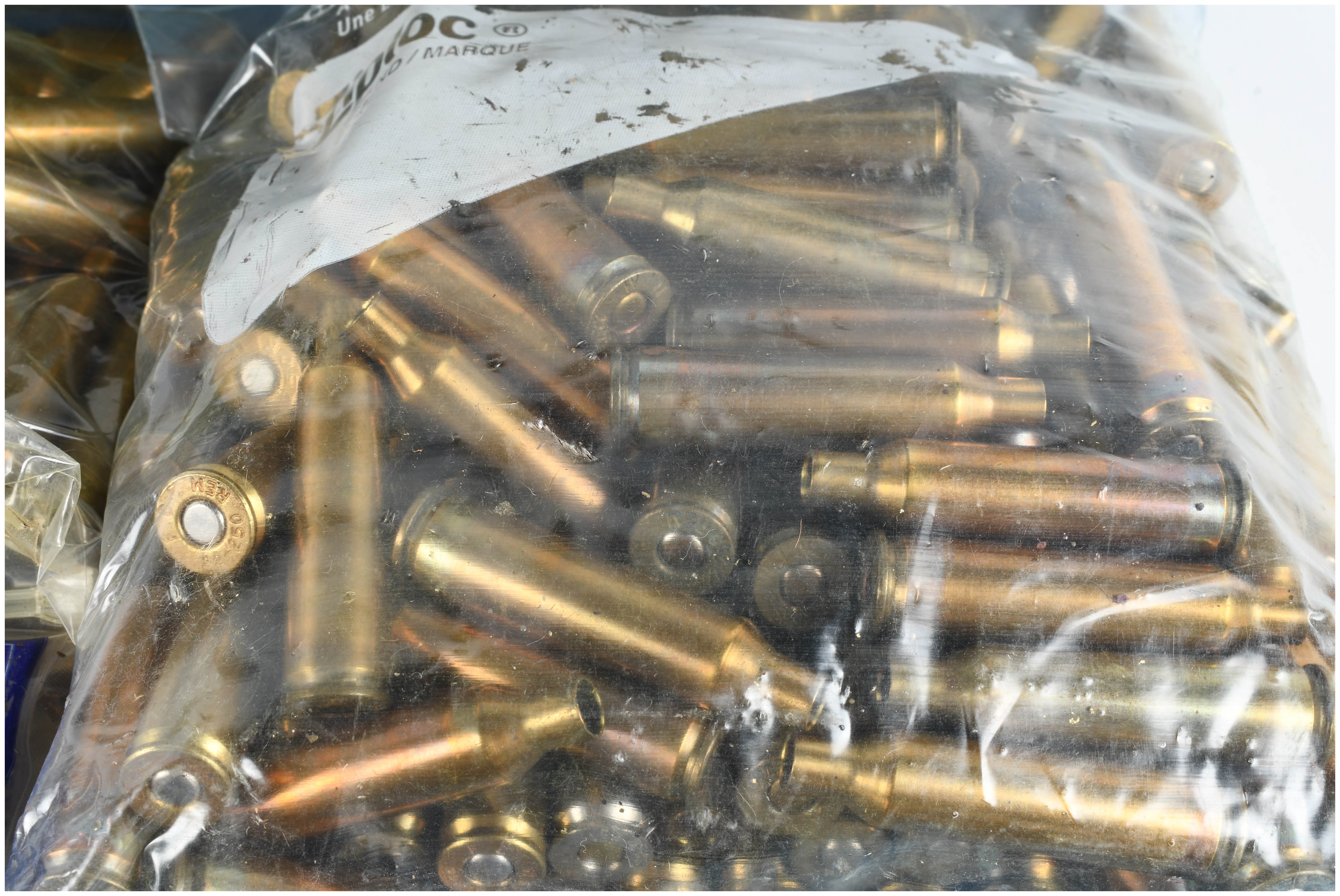 A Lot of 400 .22-250 Remington Caliber Brass Cartridge Cases and One Ammunition Can