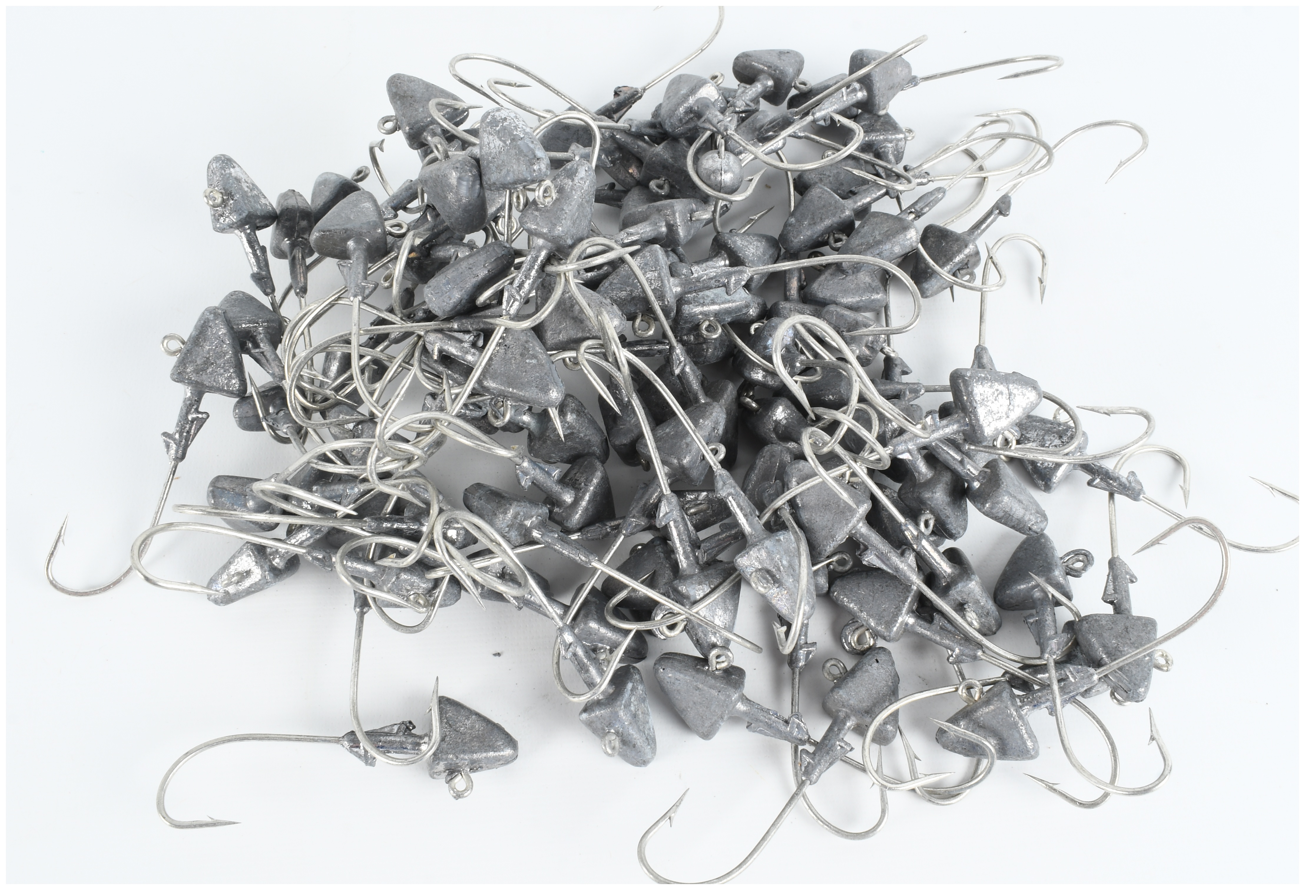 A Collection of 105 Triangular Lead Fishing Jig Heads