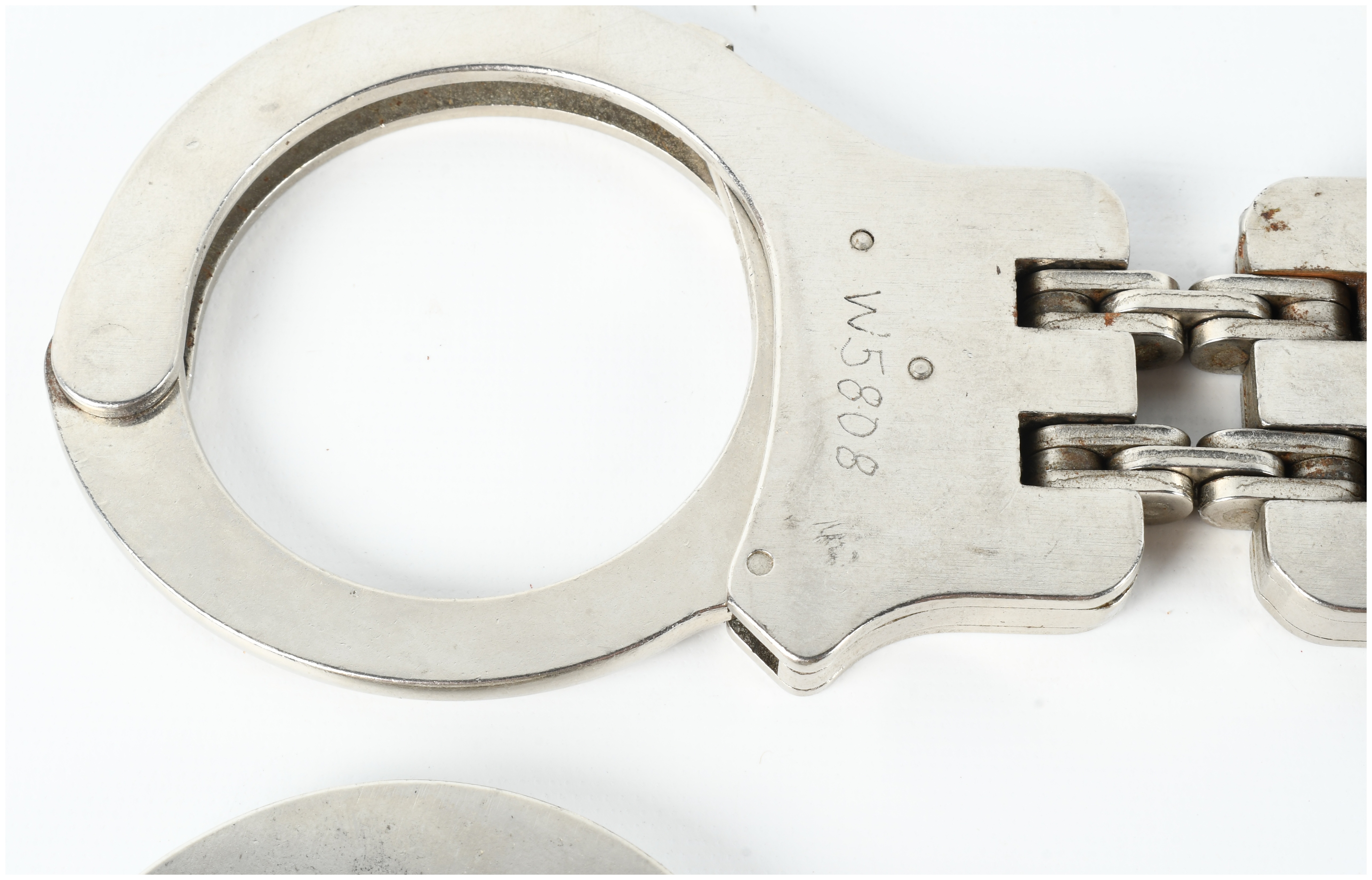 Two Pairs of Peerless Handcuffs Including Model 300 and Hinged Model