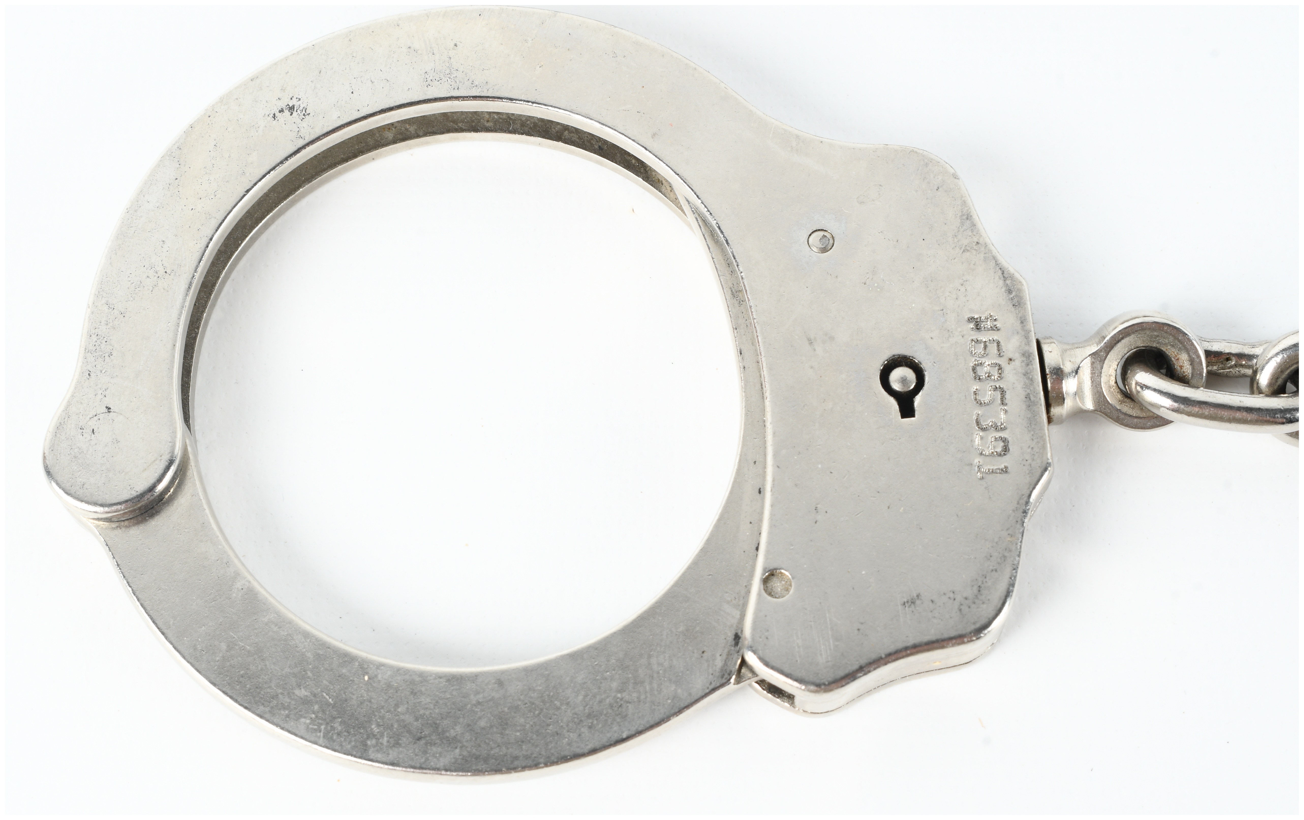 Two Pairs of Peerless Handcuffs Including Model 300 and Hinged Model