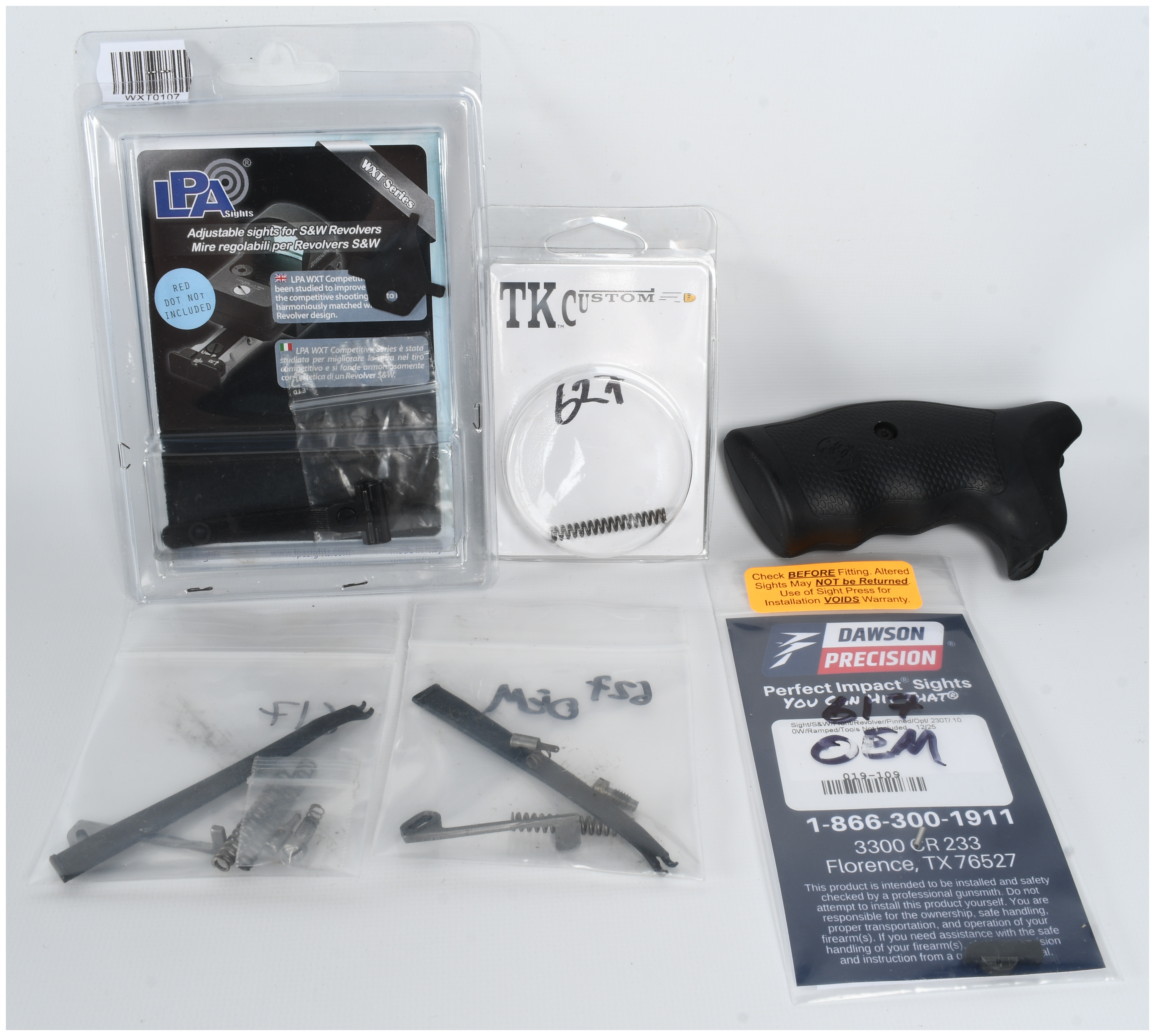 A Collection of 6 Smith & Wesson Revolver Parts and Accessories