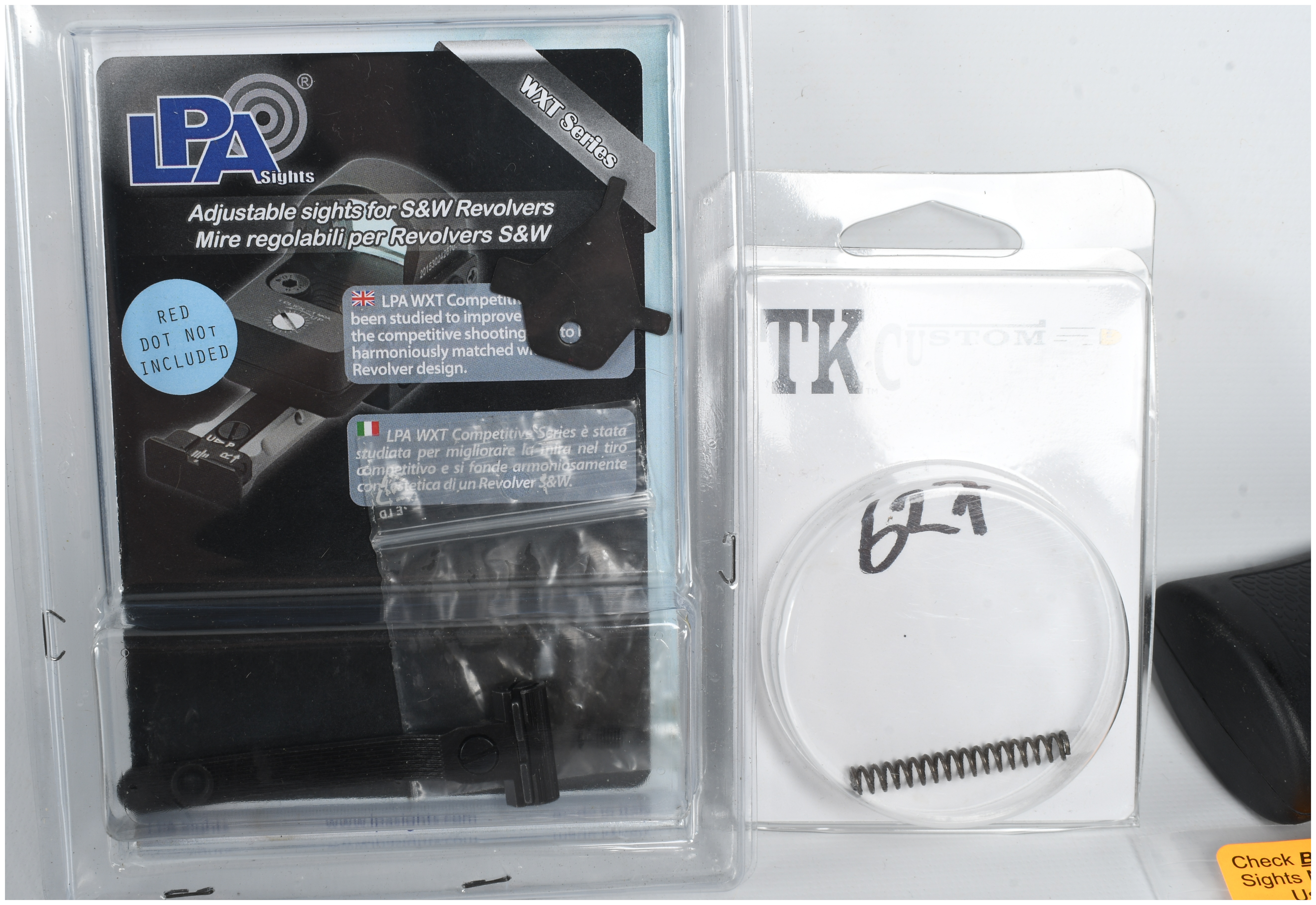 A Collection of 6 Smith & Wesson Revolver Parts and Accessories