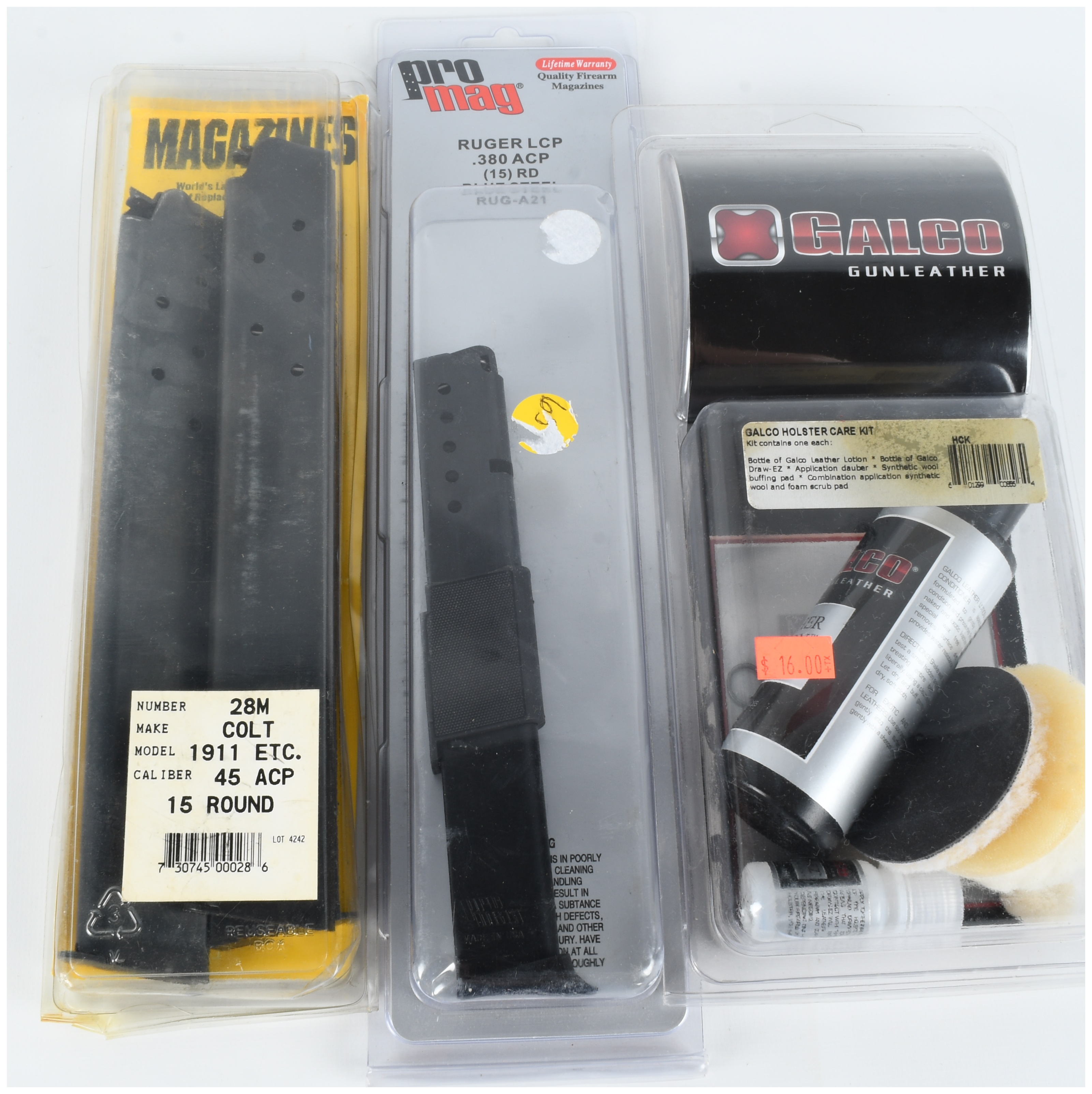 A Trio of Firearm Accessories Including 15-Round Magazines for Colt 1911 and Ruger LCP and a Galco Holster Care Kit