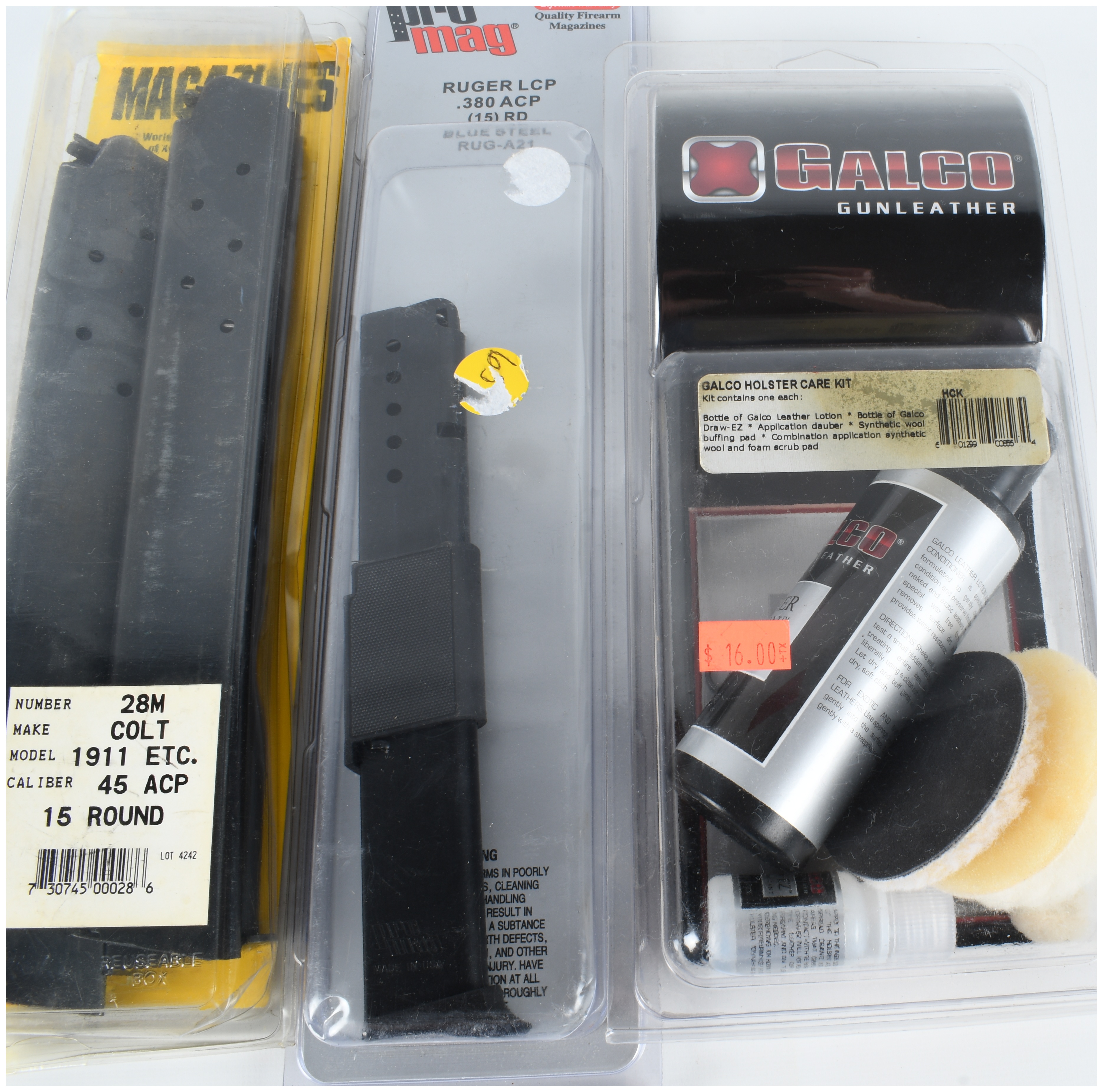 A Trio of Firearm Accessories Including 15-Round Magazines for Colt 1911 and Ruger LCP and a Galco Holster Care Kit