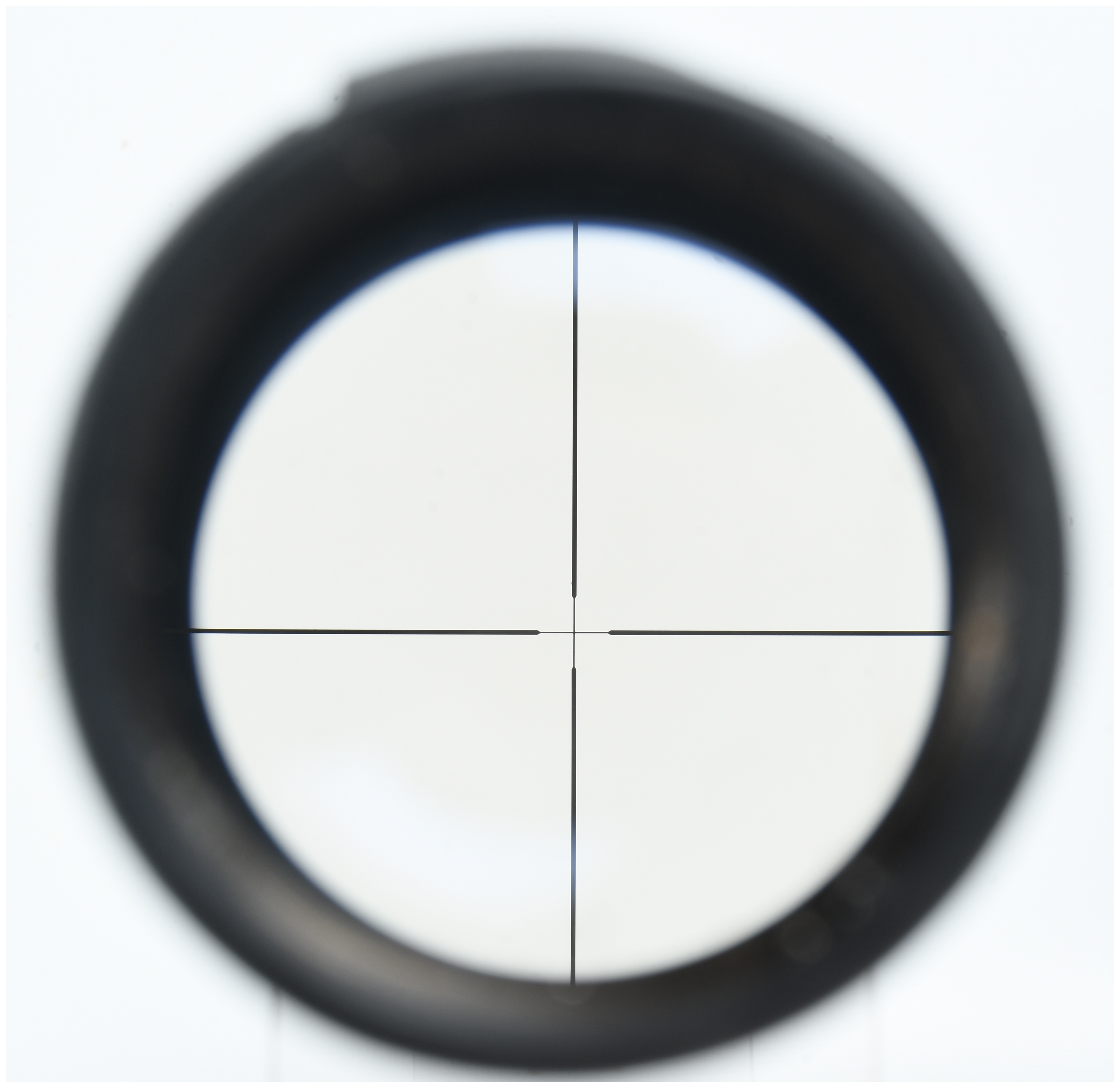 A Pair of Variable-Power Rifle Scopes Including Simmons 3-9x32 22 Mag and Tasco