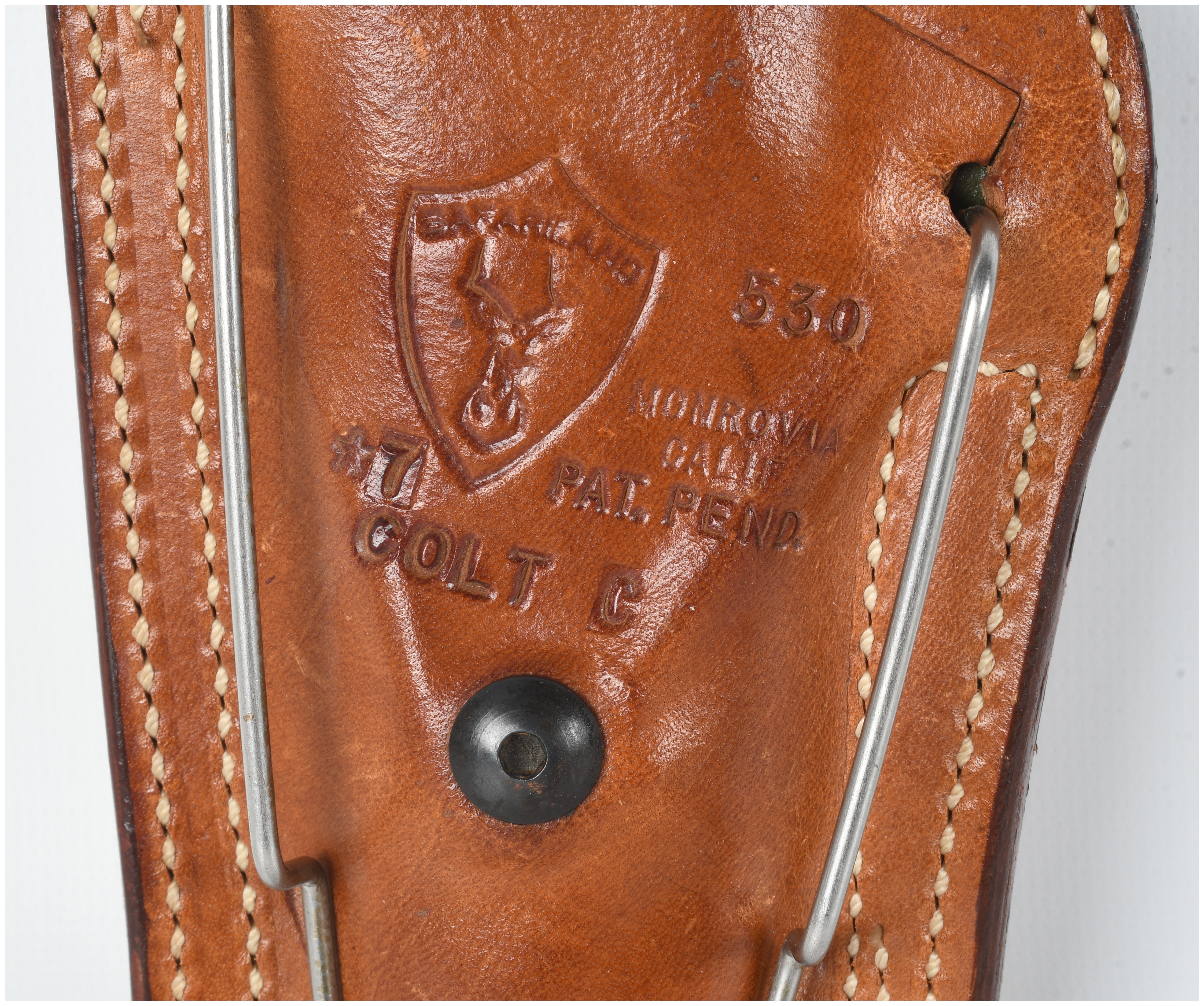 A Pair of Safariland Model 530 and Bianchi Number 4 Leather Holsters for Colt Government and Medium Auto