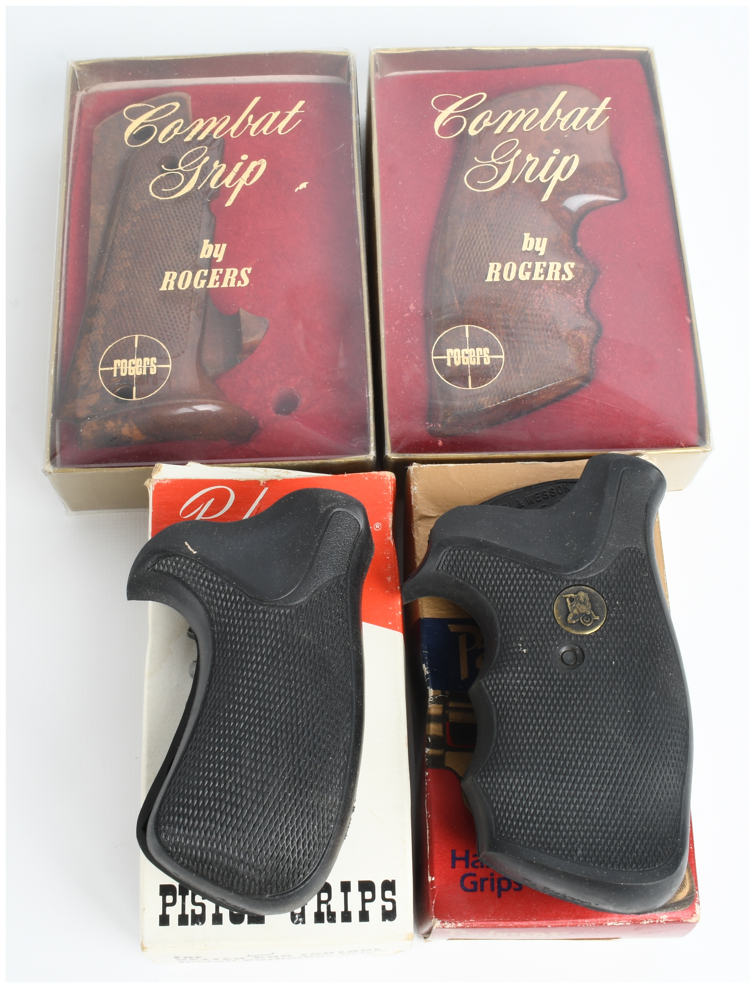A Collection of 4 Rogers and Pachmayr Pistol Grips for Colt and Smith and Wesson Handguns