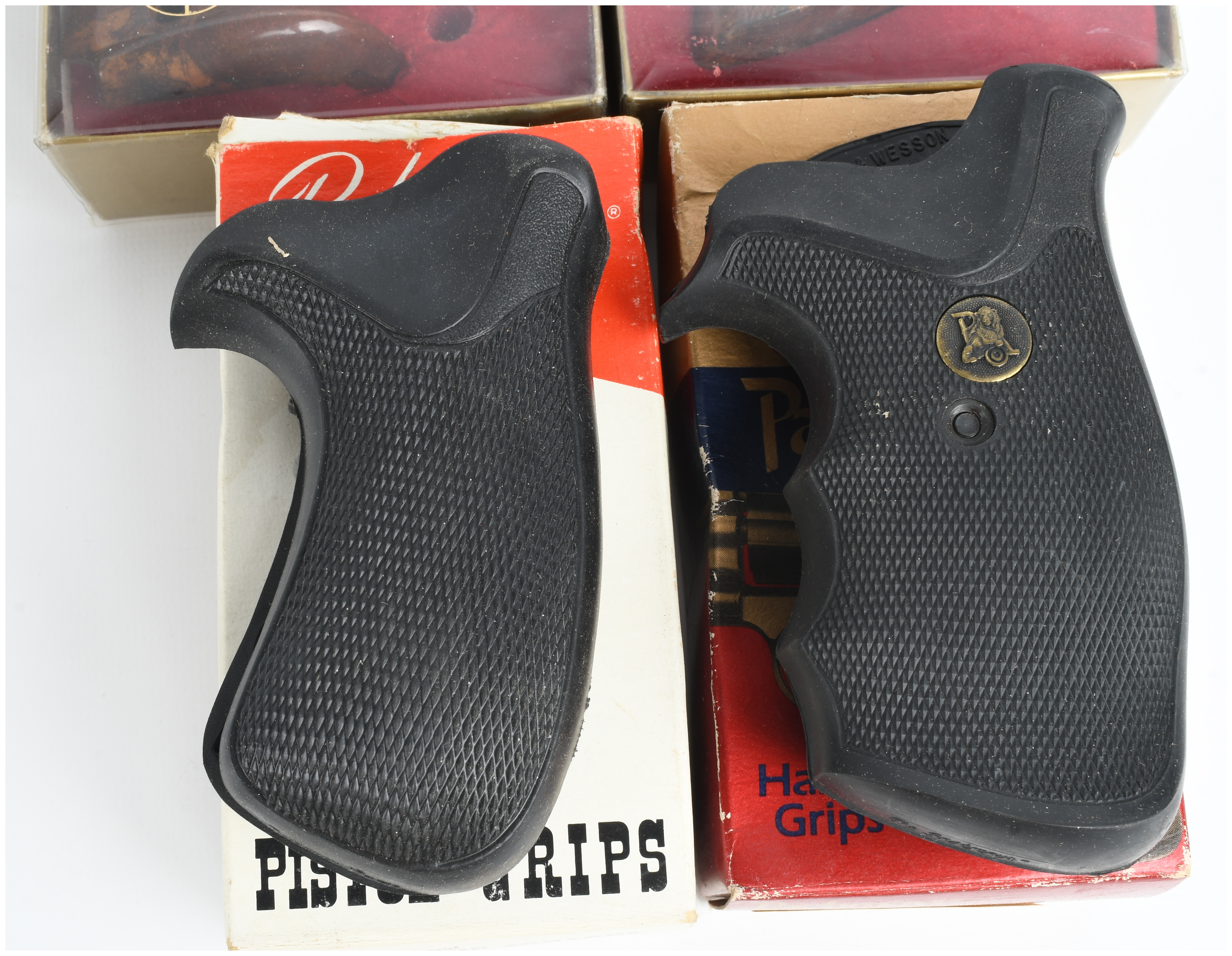 A Collection of 4 Rogers and Pachmayr Pistol Grips for Colt and Smith and Wesson Handguns