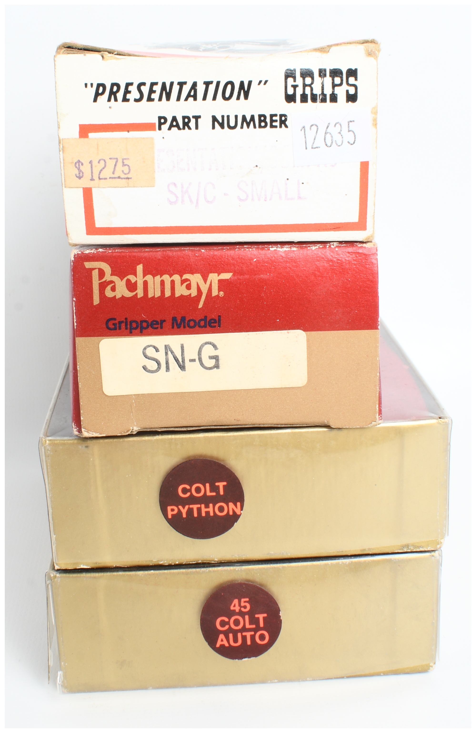 A Collection of 4 Rogers and Pachmayr Pistol Grips for Colt and Smith and Wesson Handguns