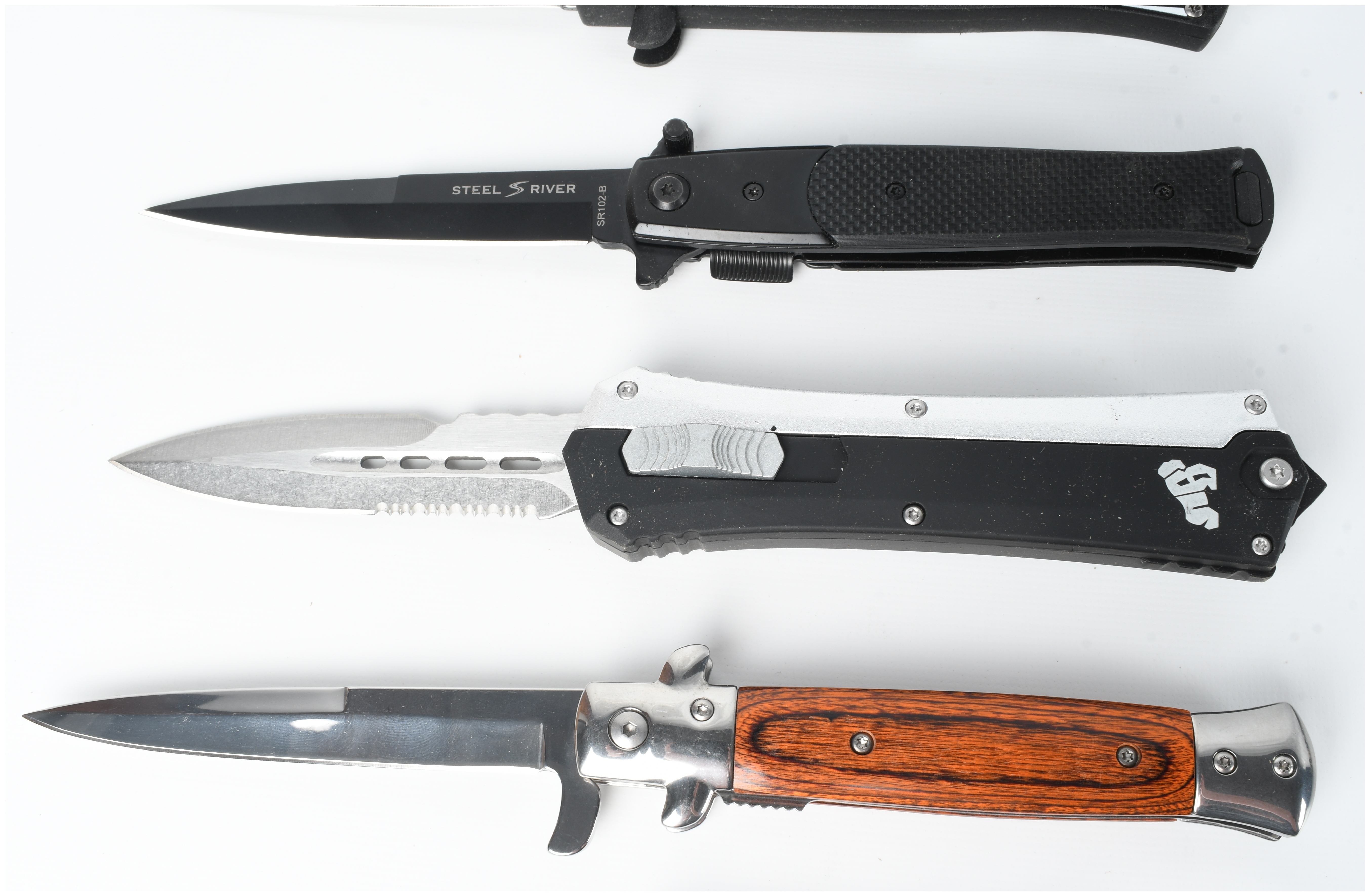 A Collection of 5 Assorted Automatic and Folding Pocket Knives