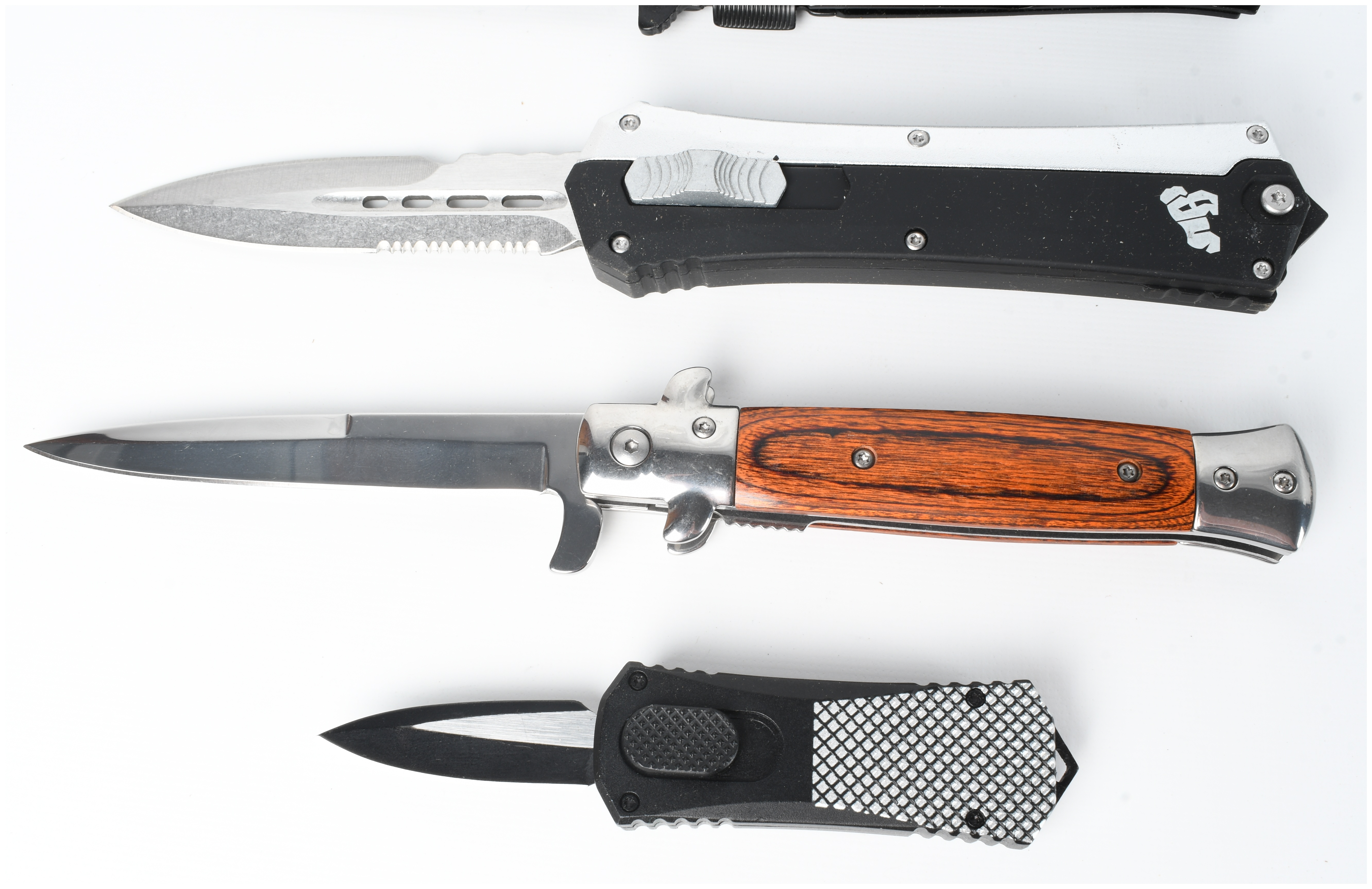 A Collection of 5 Assorted Automatic and Folding Pocket Knives