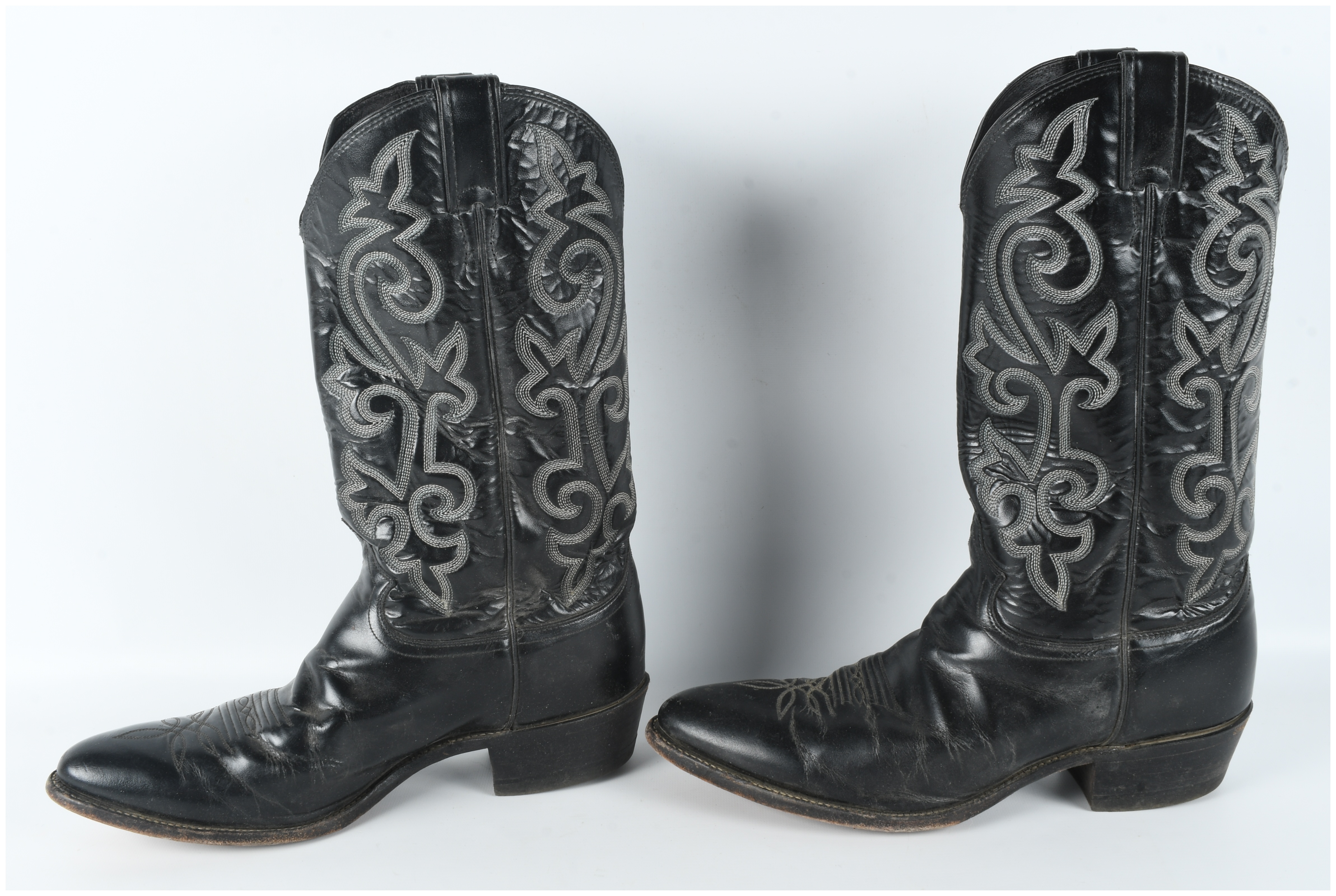 A Pair of Justin Model 1409 Men's Black Leather Western Cowboy Boots
