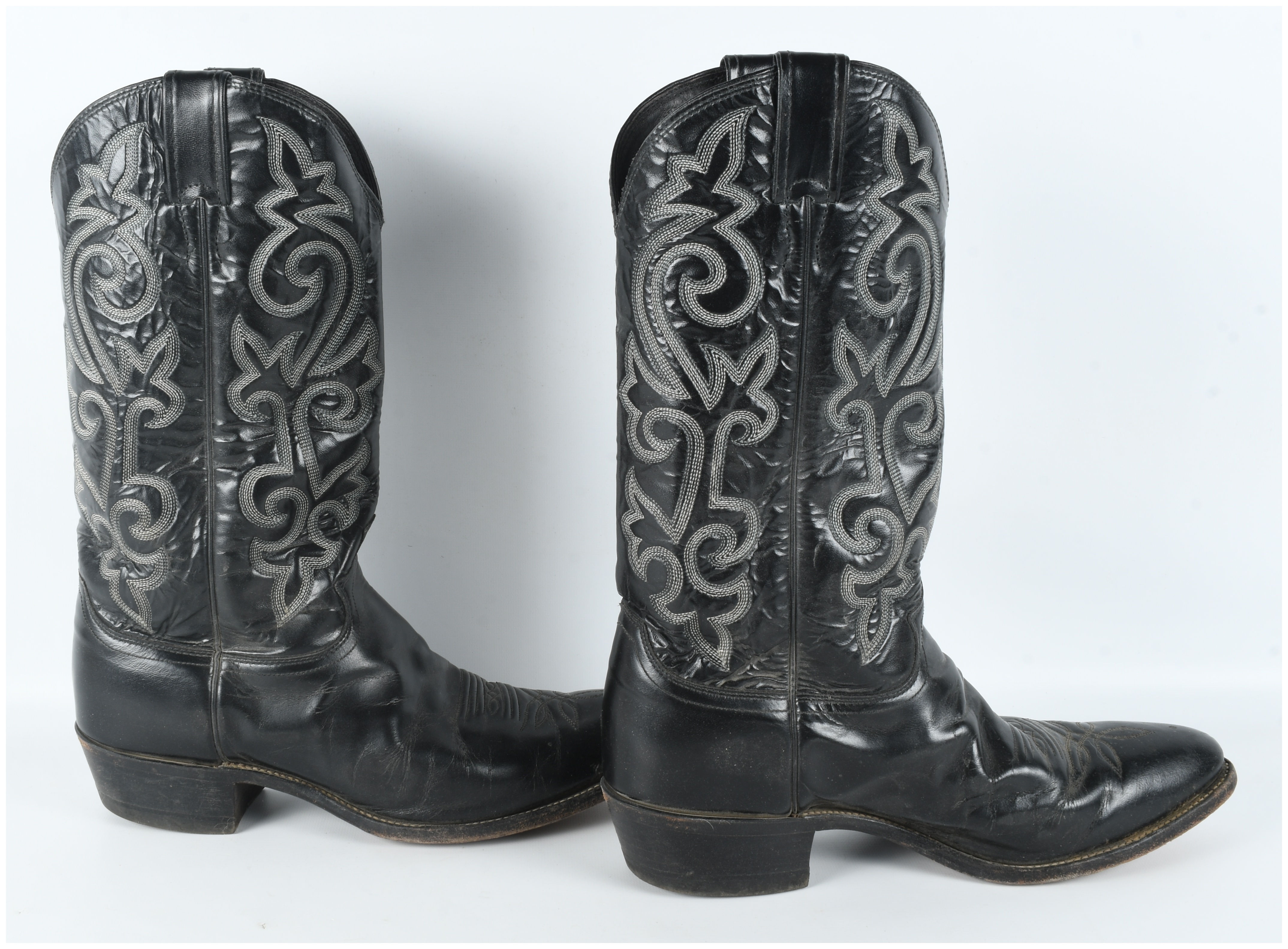 A Pair of Justin Model 1409 Men's Black Leather Western Cowboy Boots