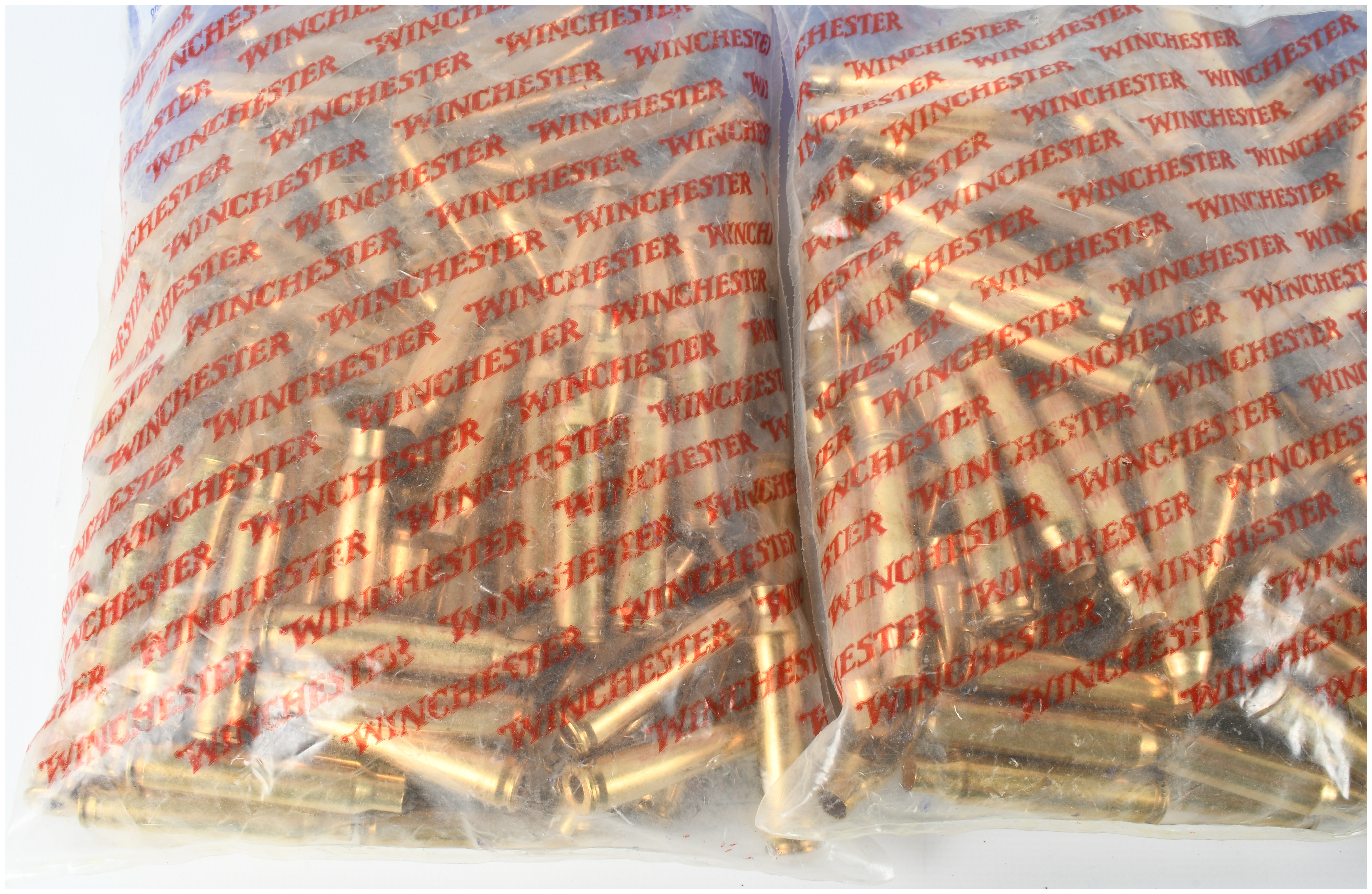 Three Packs of Winchester 223 Remington Unprimed Brass Rifle Shellcases, 300 Count