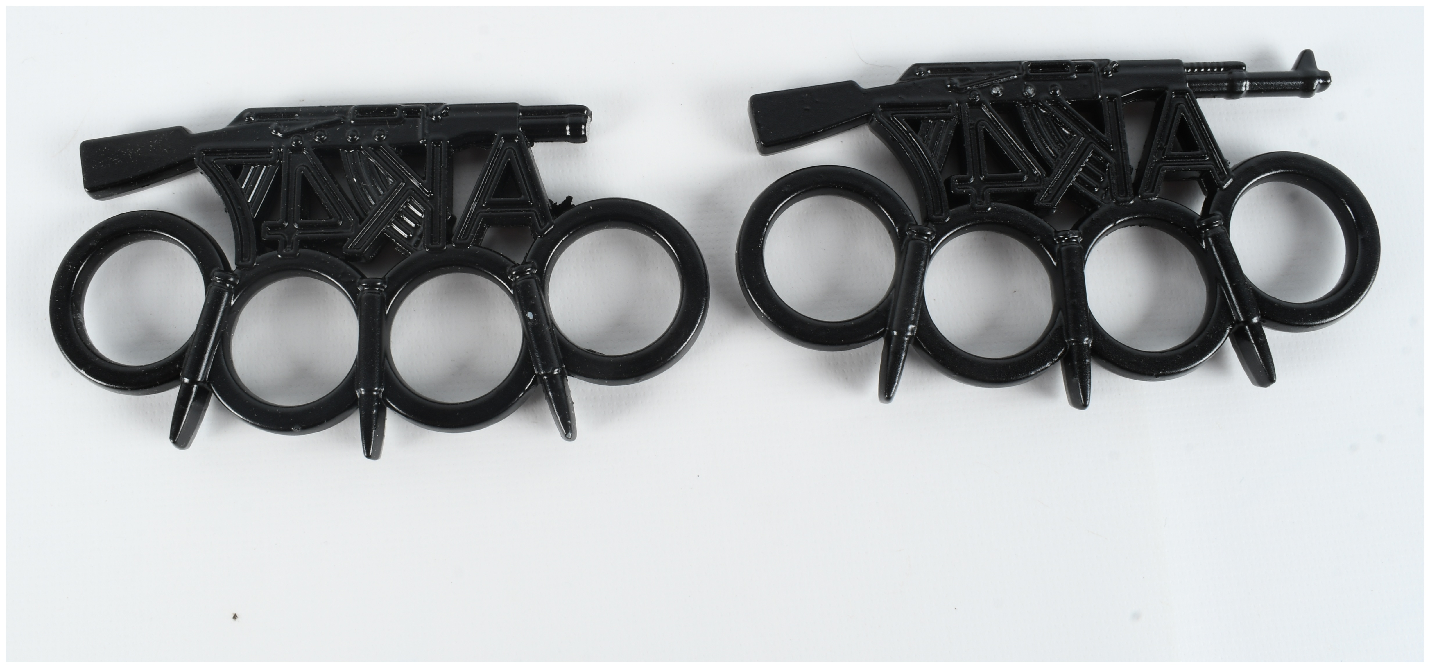 Four Boxes of Gunner Gear Brass Knuckle Dusters