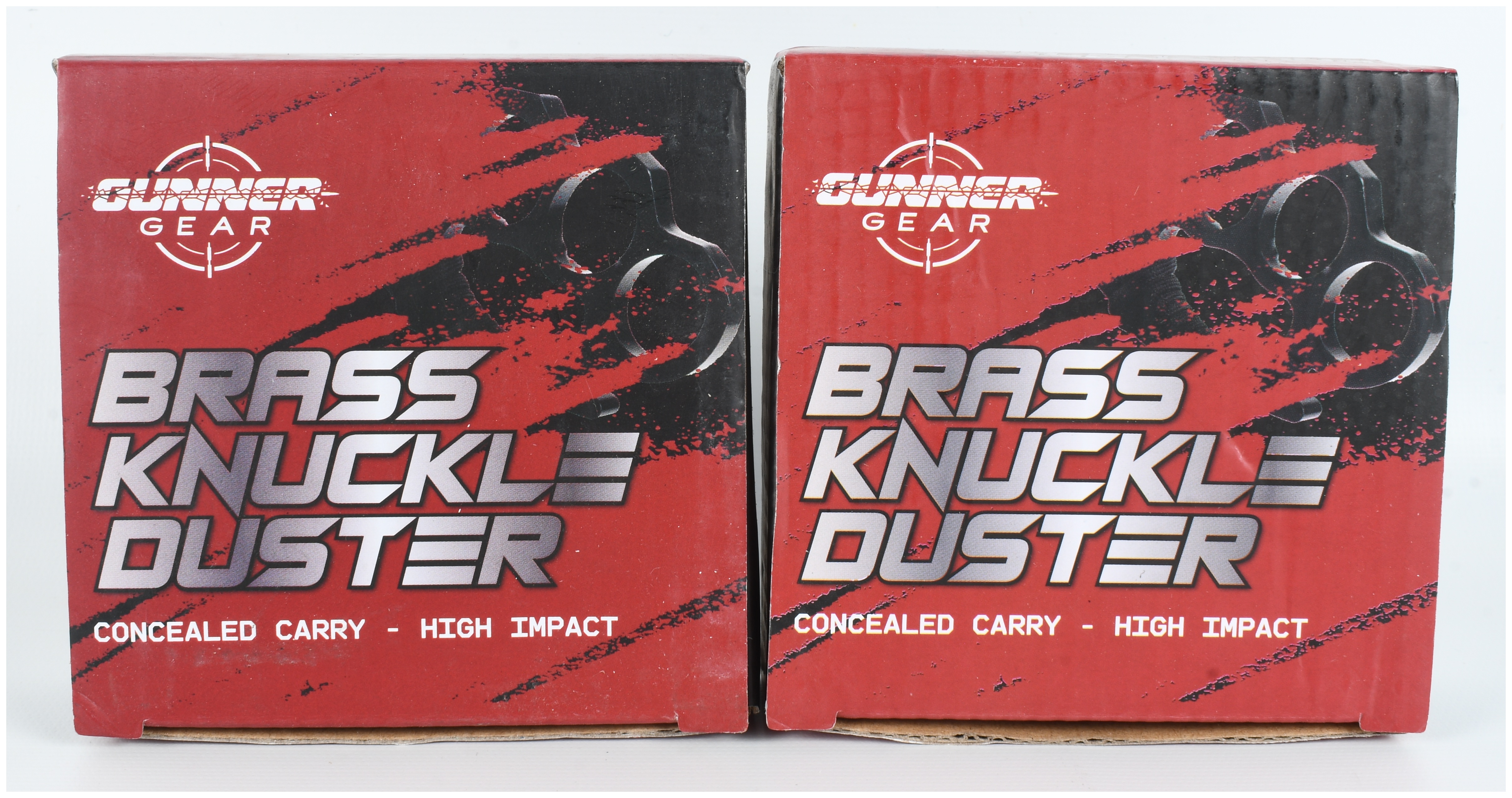 Four Boxes of Gunner Gear Brass Knuckle Dusters