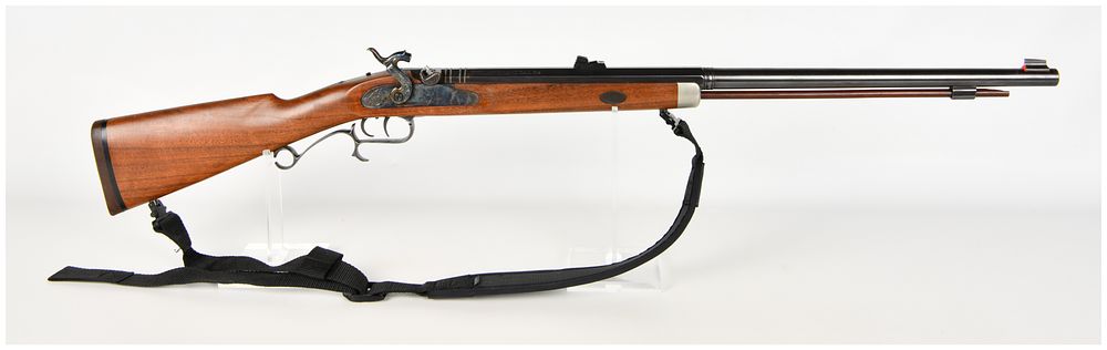 Lot 399: Thompson/Center Arms New Englander Percussion Muzzleloading Rifle .54 Caliber with Octagonal to Round Barrel