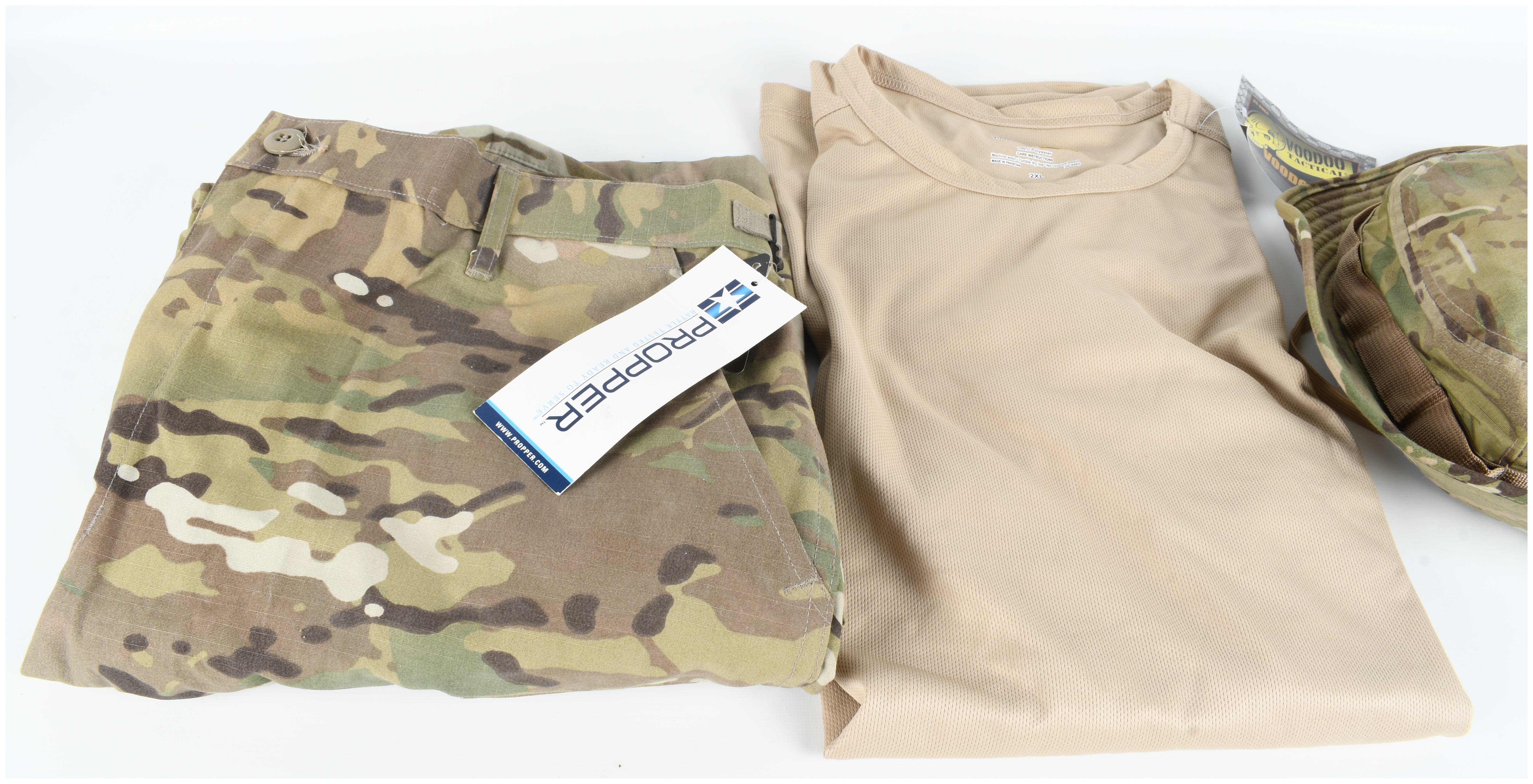 Five Piece Collection of Tactical Apparel Including Voodoo Tactical Propper and 5.11 Tactical