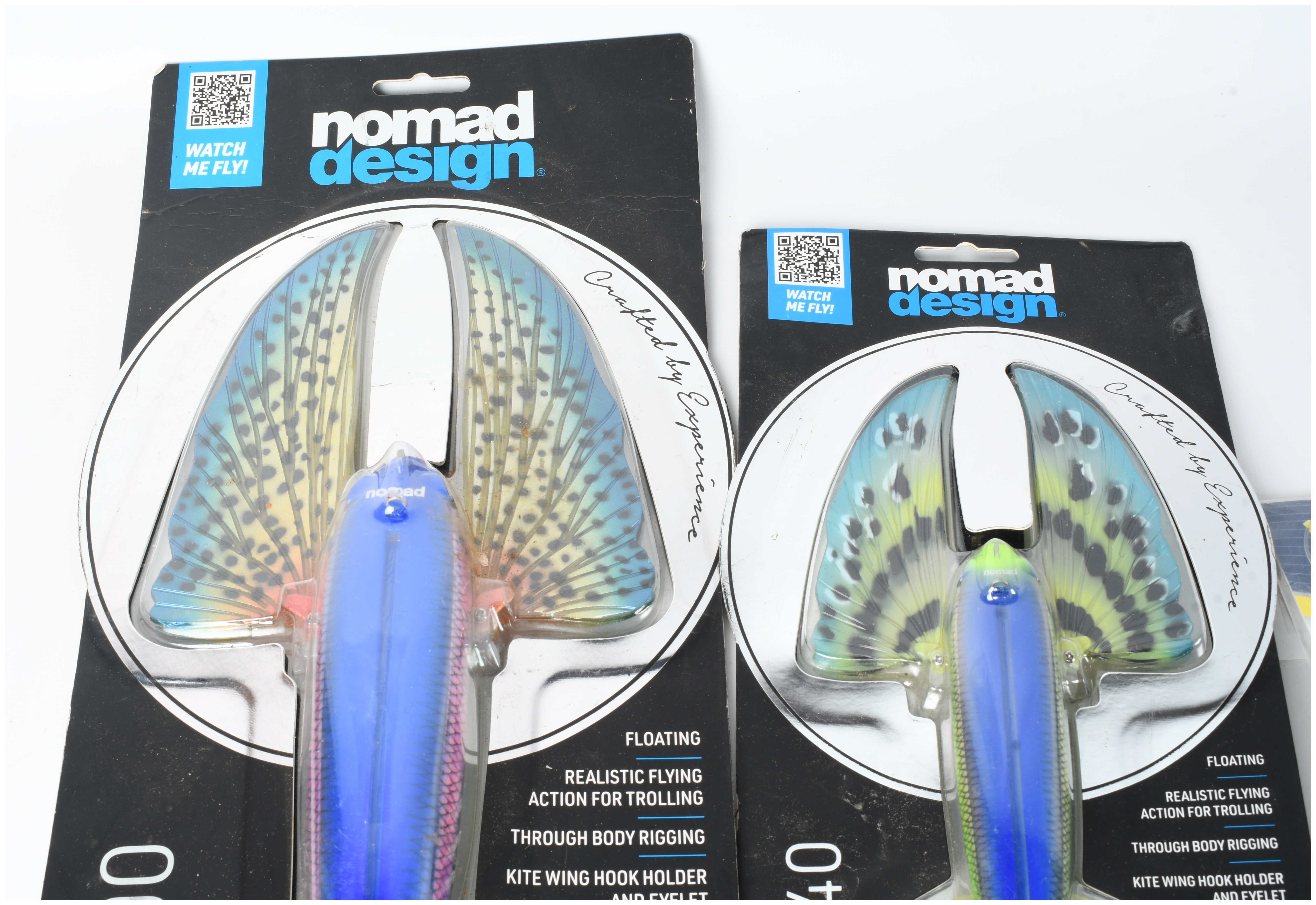 Three Pieces of Offshore Fishing Tackle Including Nomad Design Slipstream Flying Fish Lures and Diamond Leader