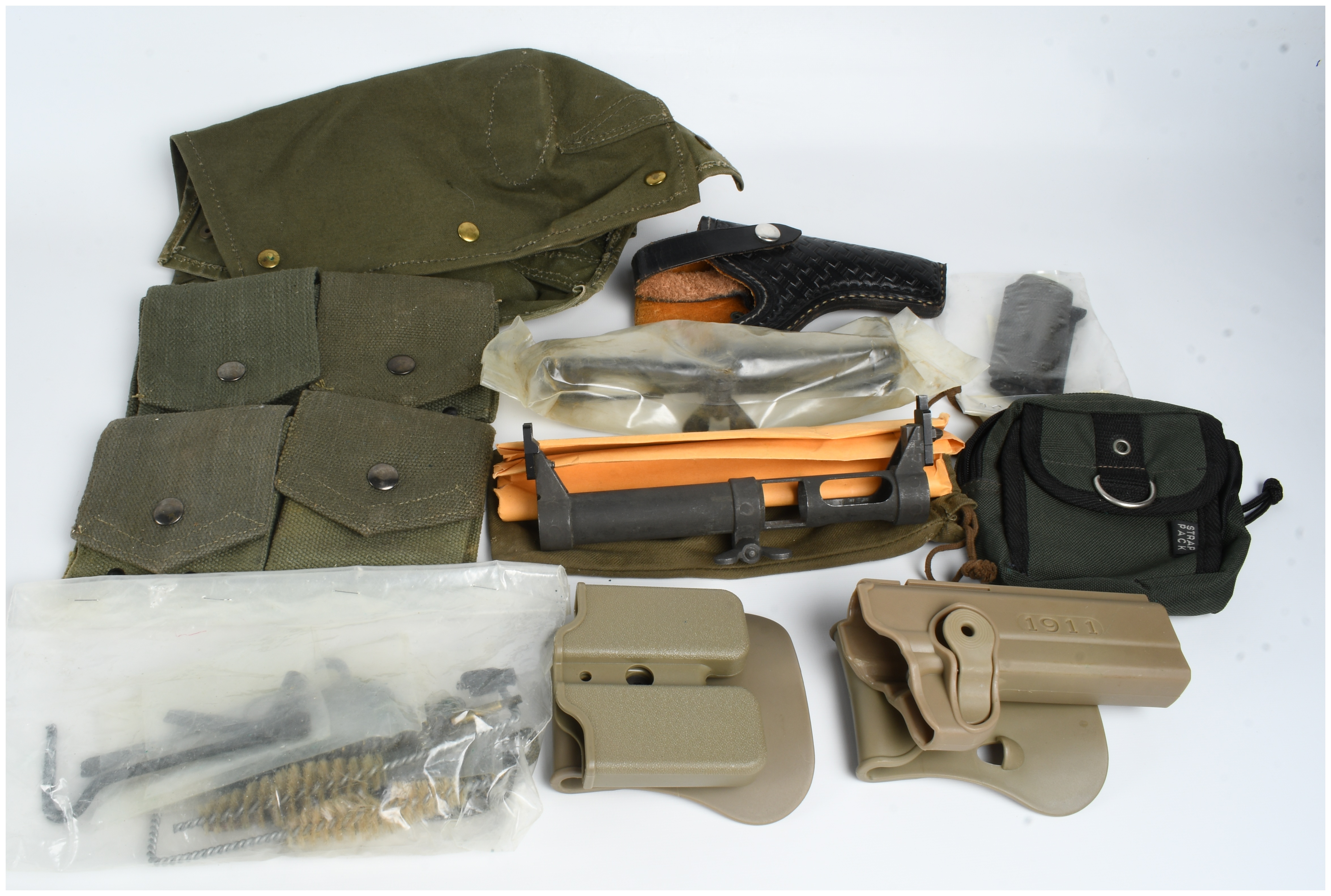 A Collection of 12 Military Firearm Accessories and Field Gear Including MAS 49 and 1911 Equipment