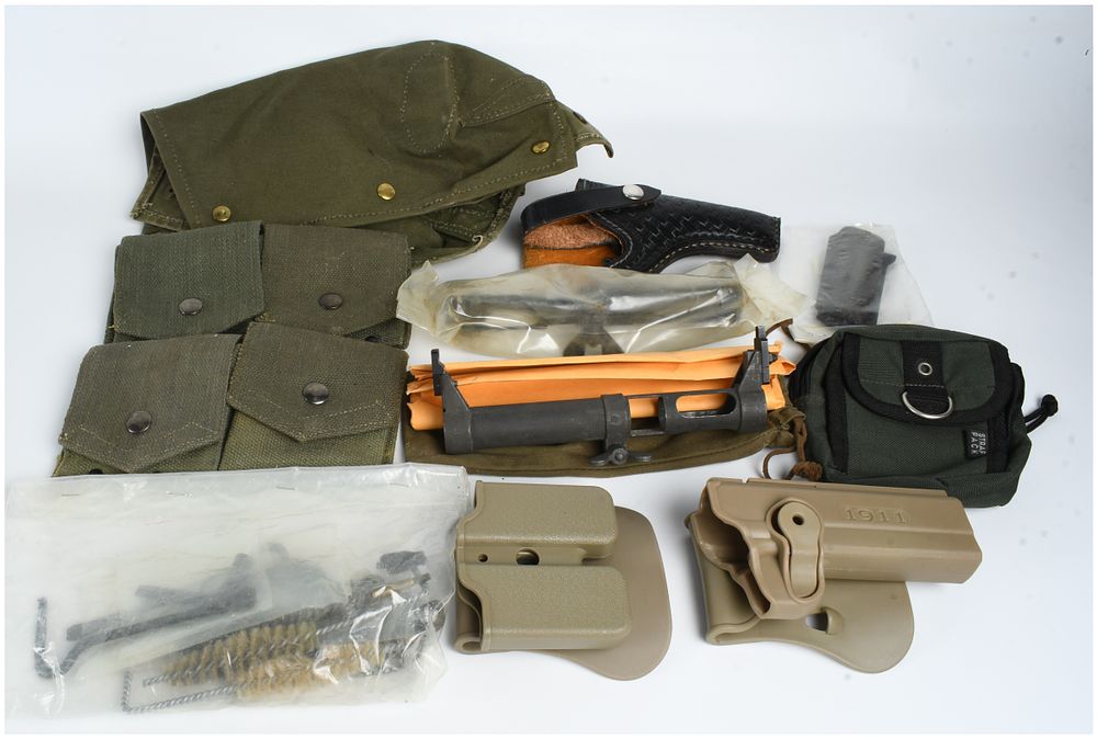 Lot 449: A Collection of 12 Military Firearm Accessories and Field Gear Including MAS 49 and 1911 Equipment