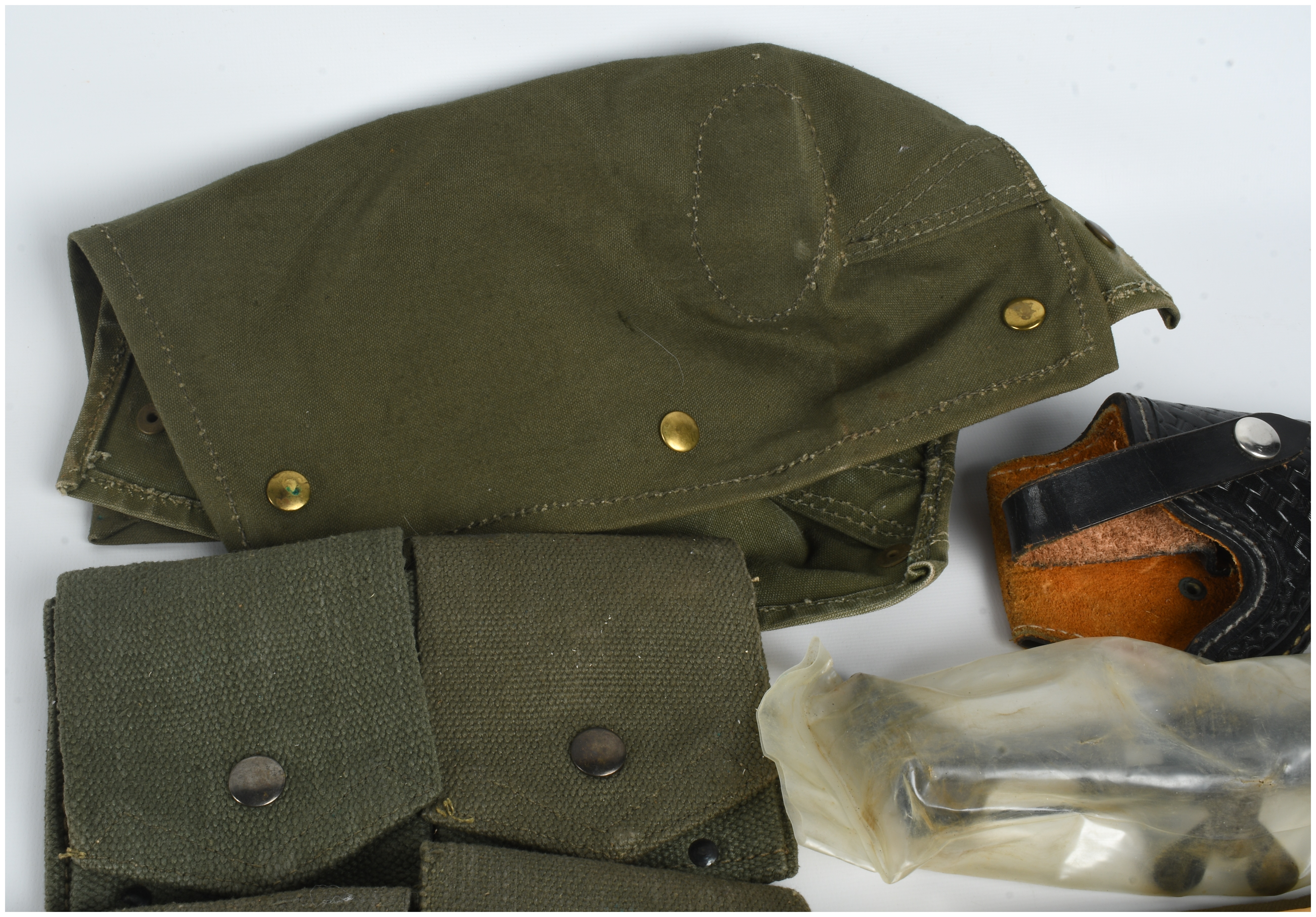 A Collection of 12 Military Firearm Accessories and Field Gear Including MAS 49 and 1911 Equipment