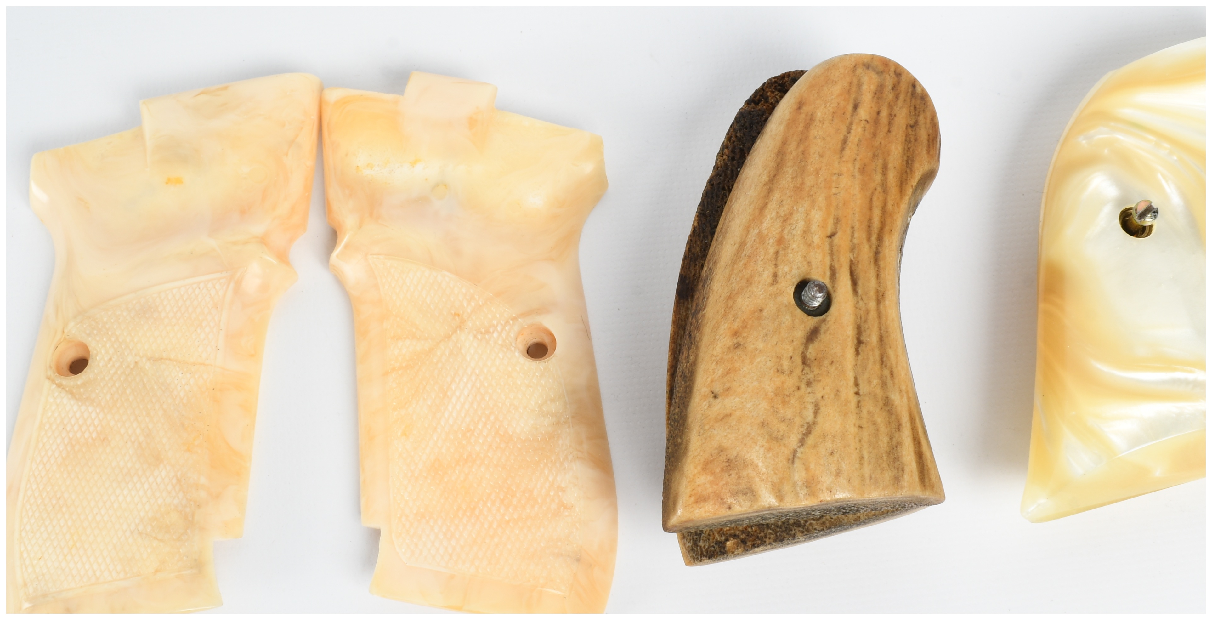 A Trio of Assorted Handgun Grip Sets
