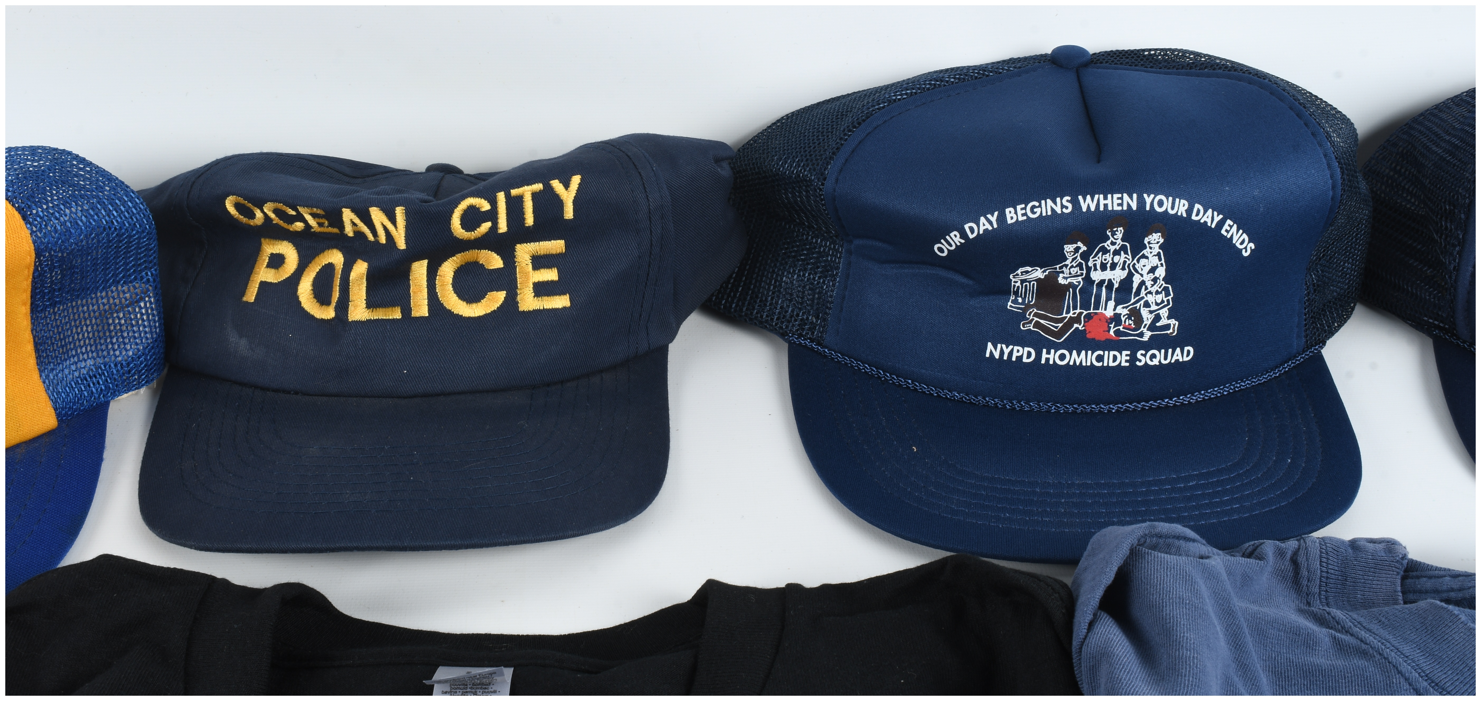 A Lot of 8 Law Enforcement Themed T-Shirts and Baseball Hats