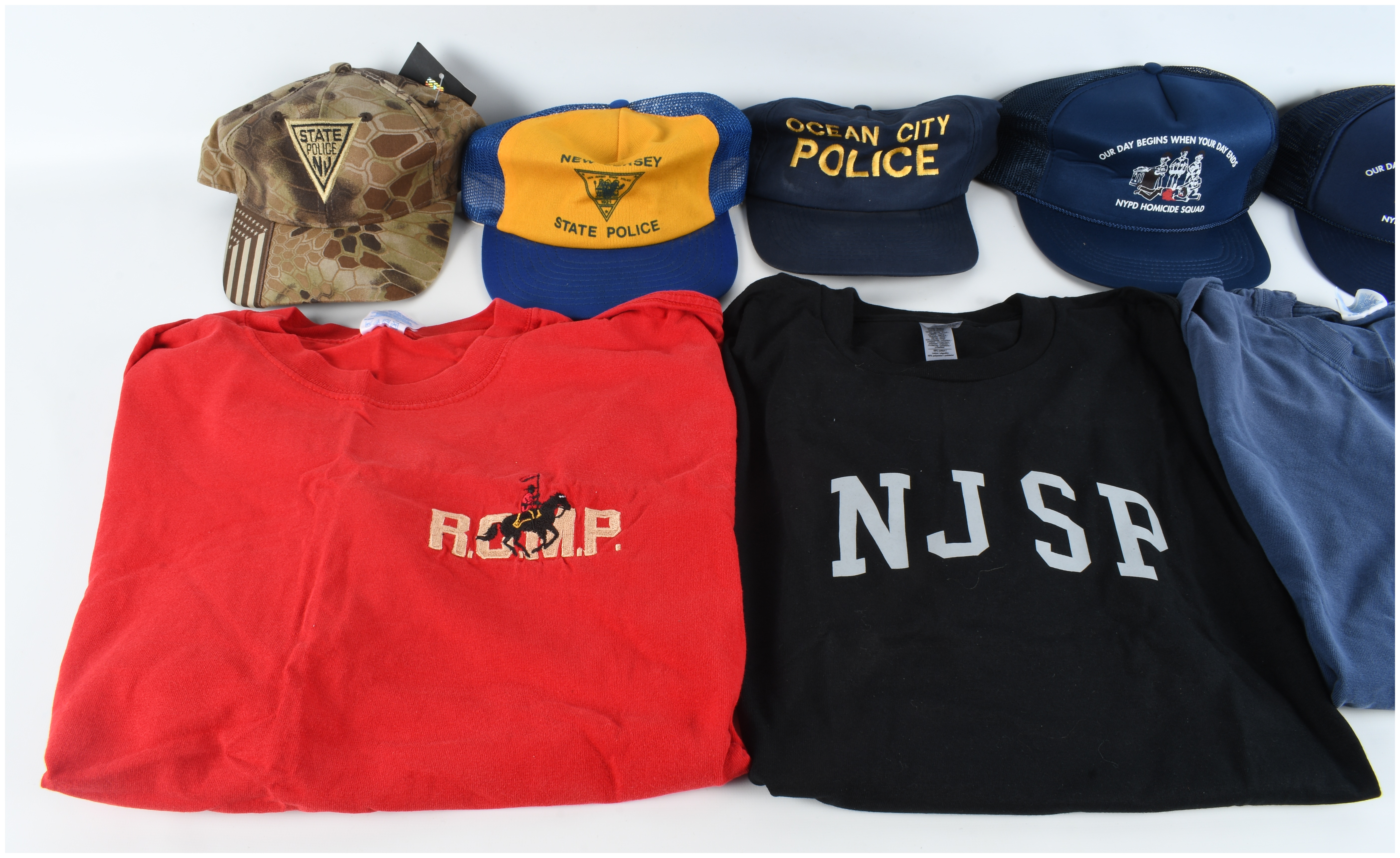 A Lot of 8 Law Enforcement Themed T-Shirts and Baseball Hats