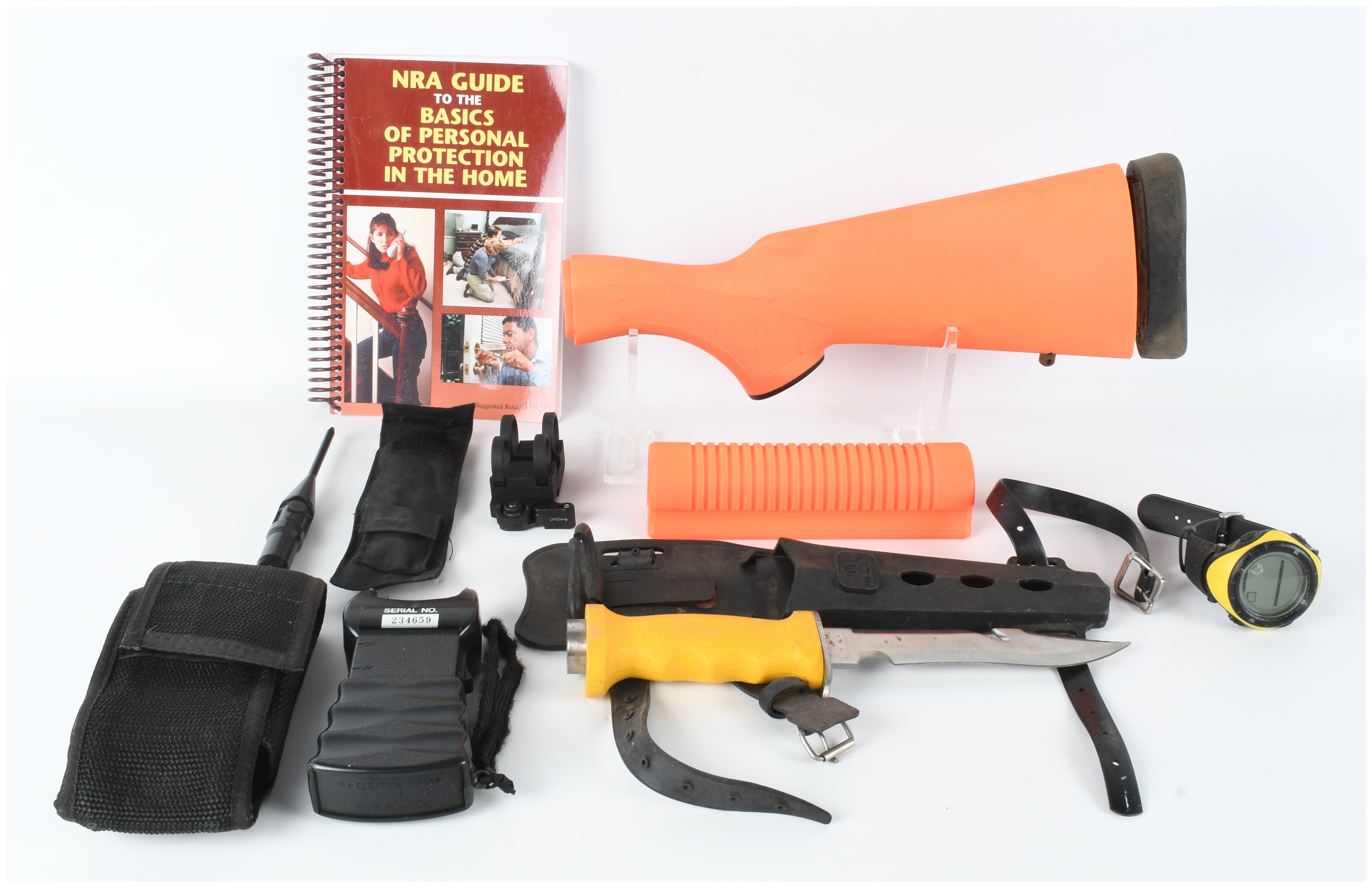 An Assortment of Personal Protection and Field Equipment including Hogue Less Lethal Shotgun Furniture
